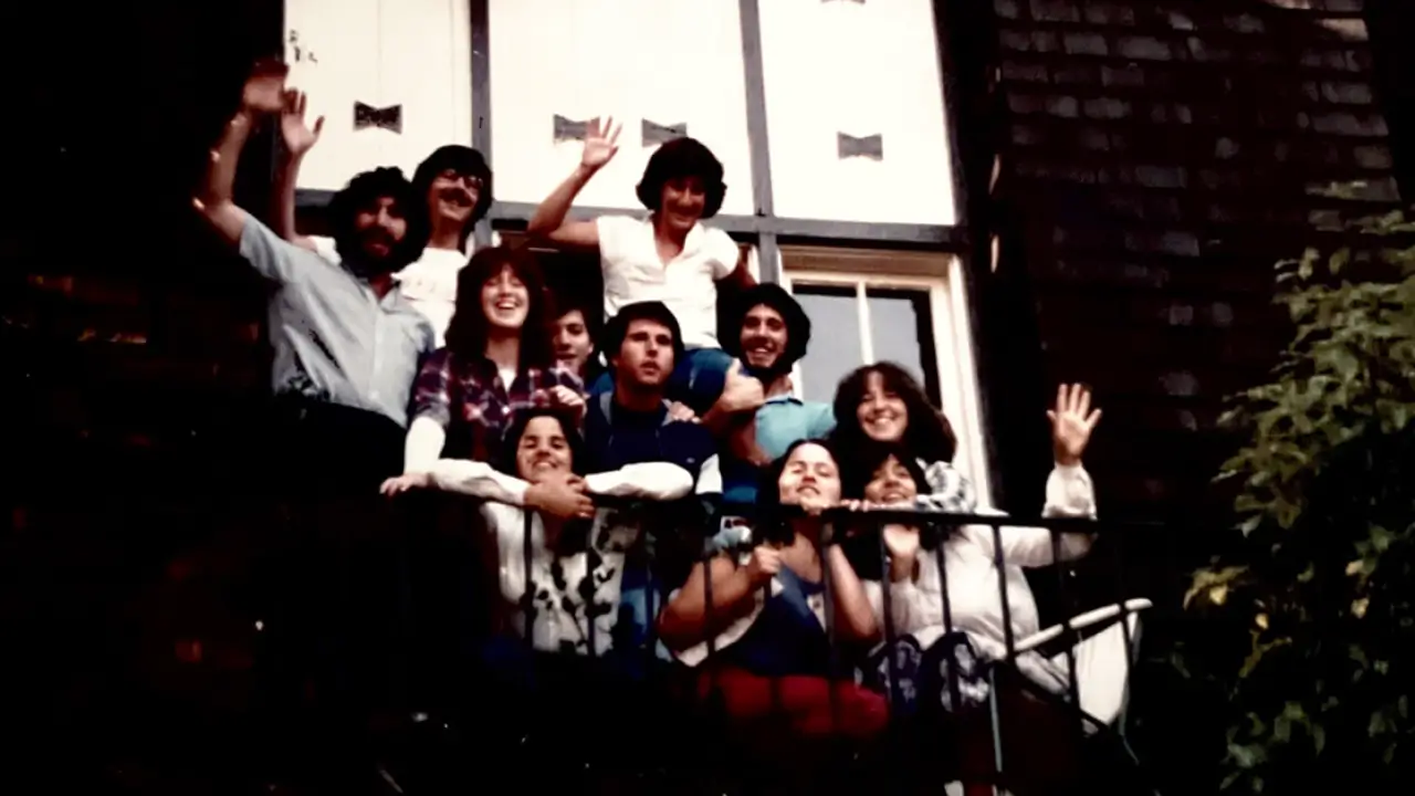 The 11 founding residents of the Berkeley Bayit on the deck of the house in 1980.