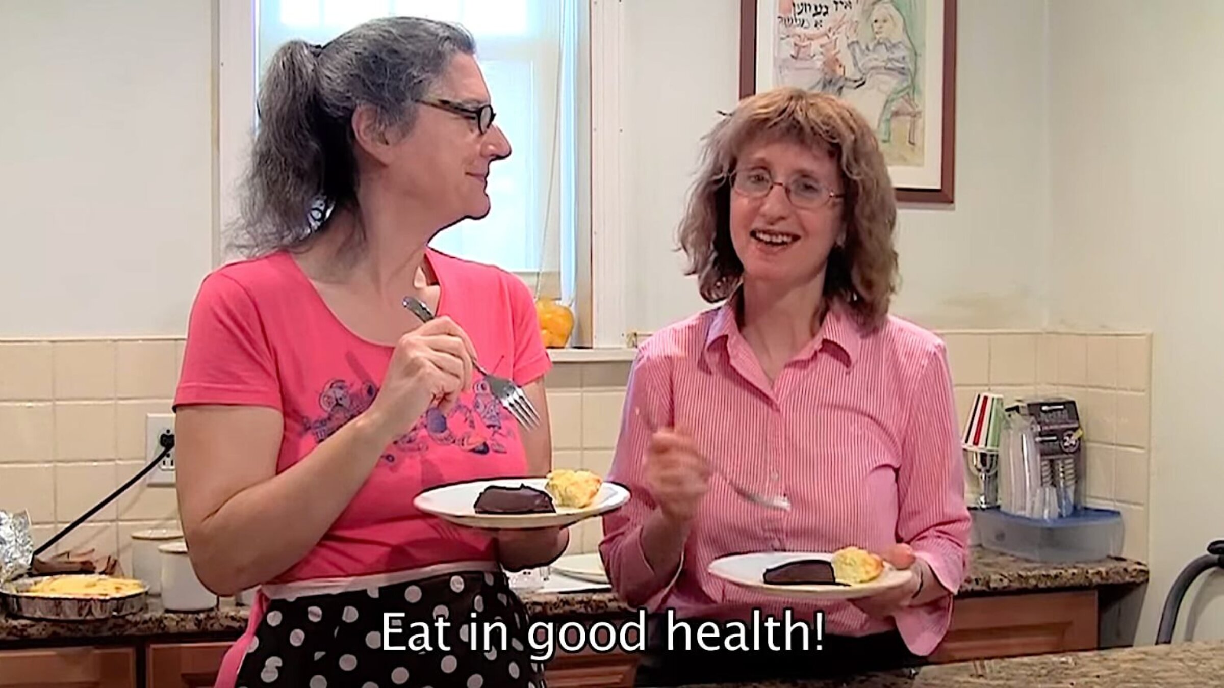 Forward Yiddish editor Rukhl Schaechter and Yiddish food scholar and chef Eve Jochnowitz enjoy the fruits of their labor