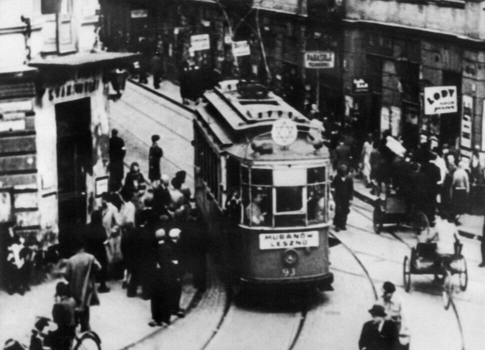 File picture taken in the 1940s of a tramway going around a street of the Warsaw Jewish ghetto, displaying a star of David.