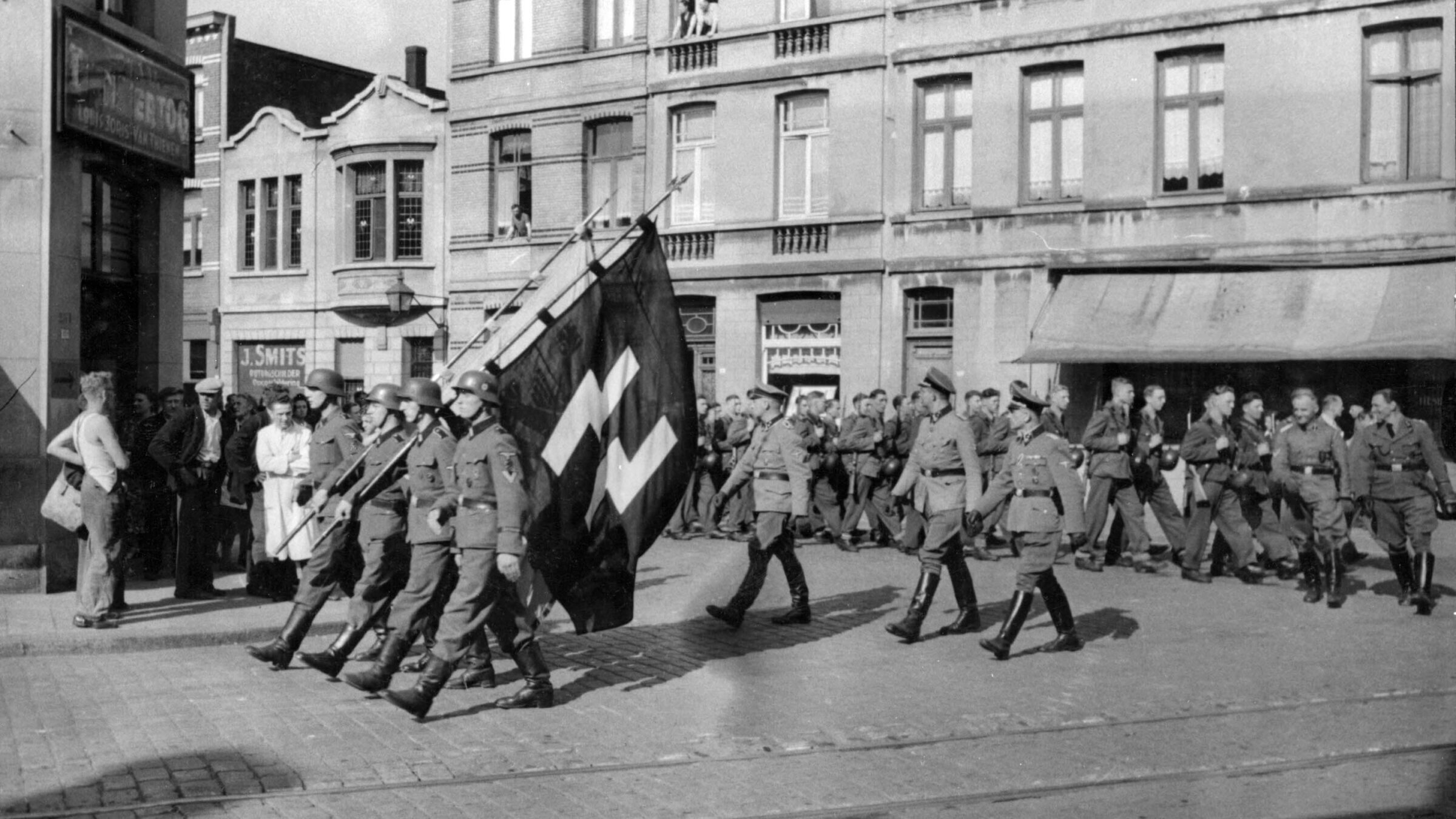 Flemish Waffen-SS volunteers ceremony, most likely before departing for the Eastern Front, Castle Sterckshof, Antwerp (Yad Vashem). 