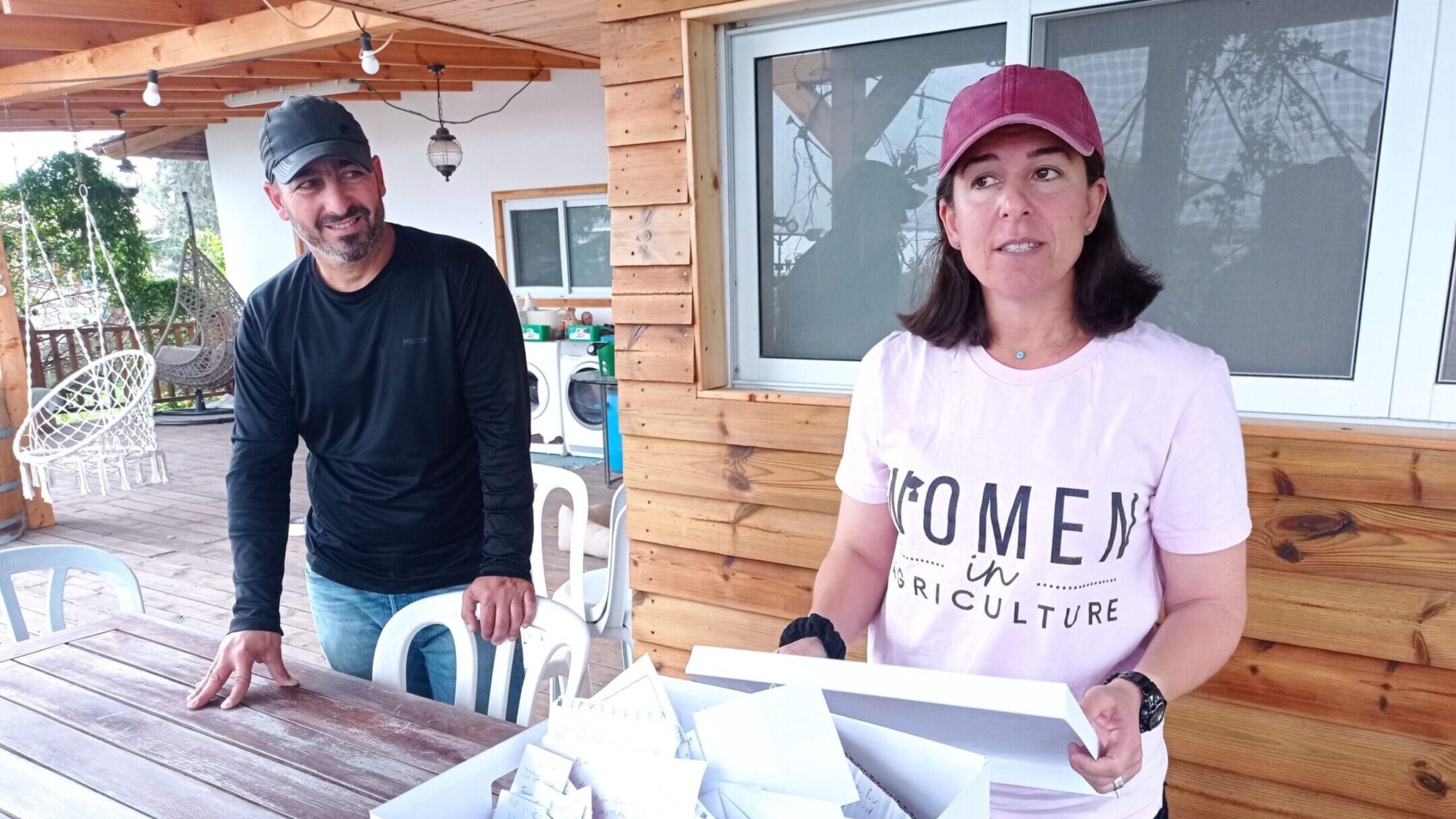 Ilana Toweg, right, and her husband Doron field countless prayer requests because of their prominence as Israel farmers strictly observing shmita, Jewish laws about letting farmland lie fallow every seven years. (Deborah Danan)