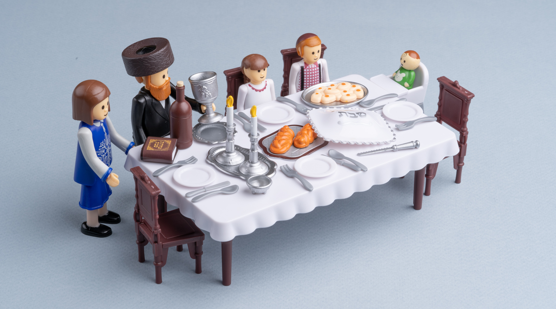 A “Shabbos Table” set from Kids Play depicts a typical haredi Orthodox family at home. The designer, Shlomi Eiger, says the brand is part of a “contemporary trend of Haredi children’s toys and games designed from within the community.” (Omar Friedman)