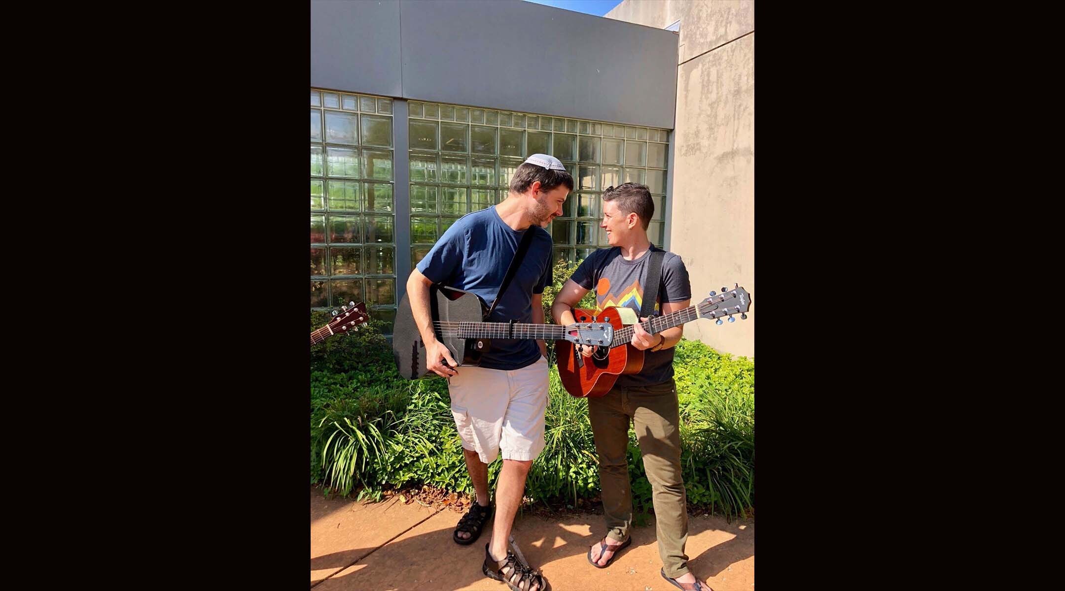 Rabbi Daniel Bogard (left) and Shira Berkowitz (right) lead songs at Camp Ramot Amoona. (Courtesy Shira Berkowitz)