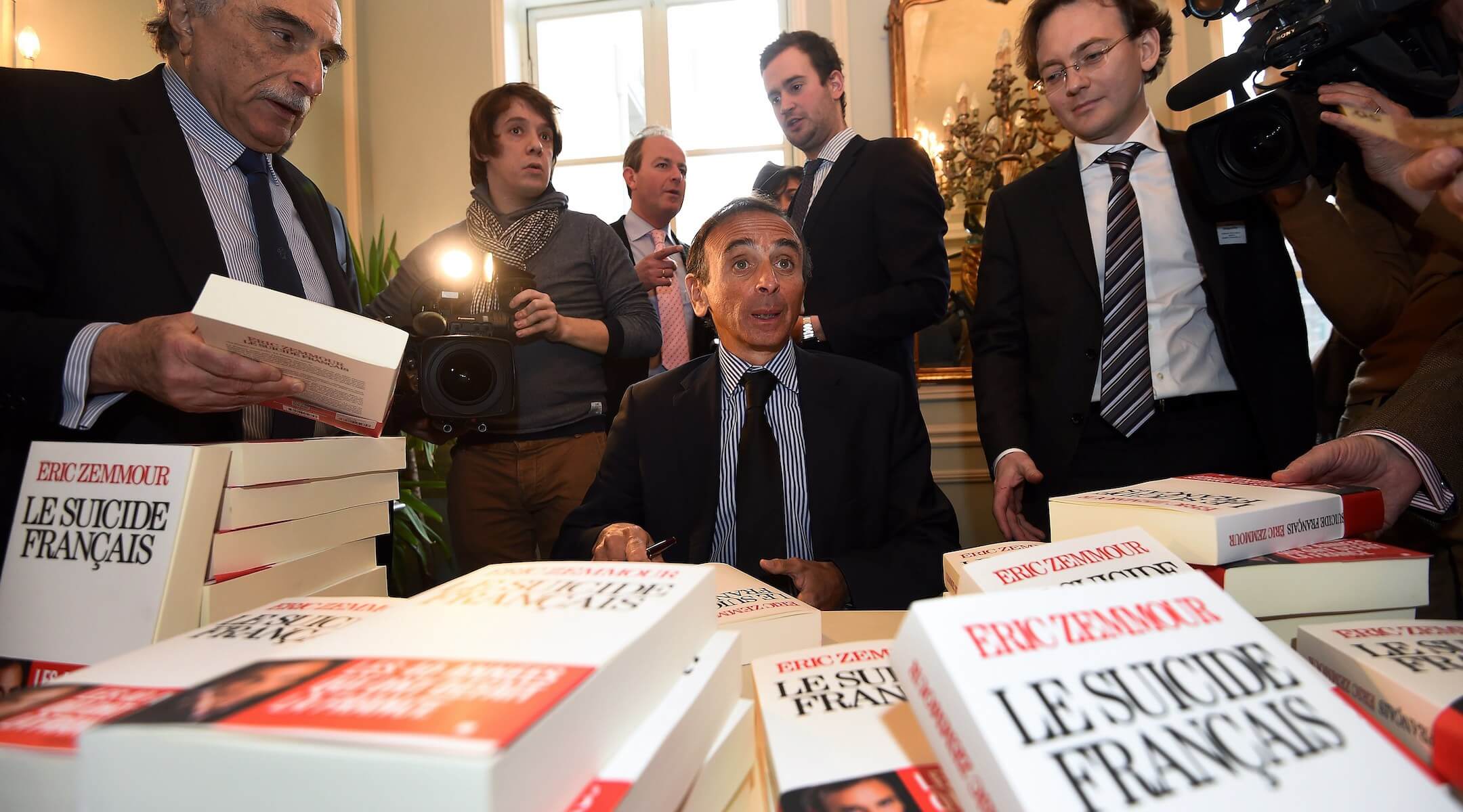 Eric Zemmour signs copies of his book "The French Suicide" at the Cercle de Lorraine-Club Van Lotharingen in Brussels, Belgium, Jan. 6, 2015. 