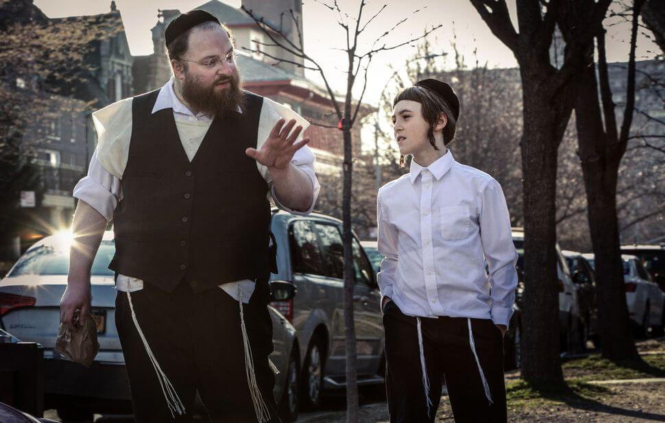 Menashe Lustig and Ruben Niborski in 2017's "Menashe."