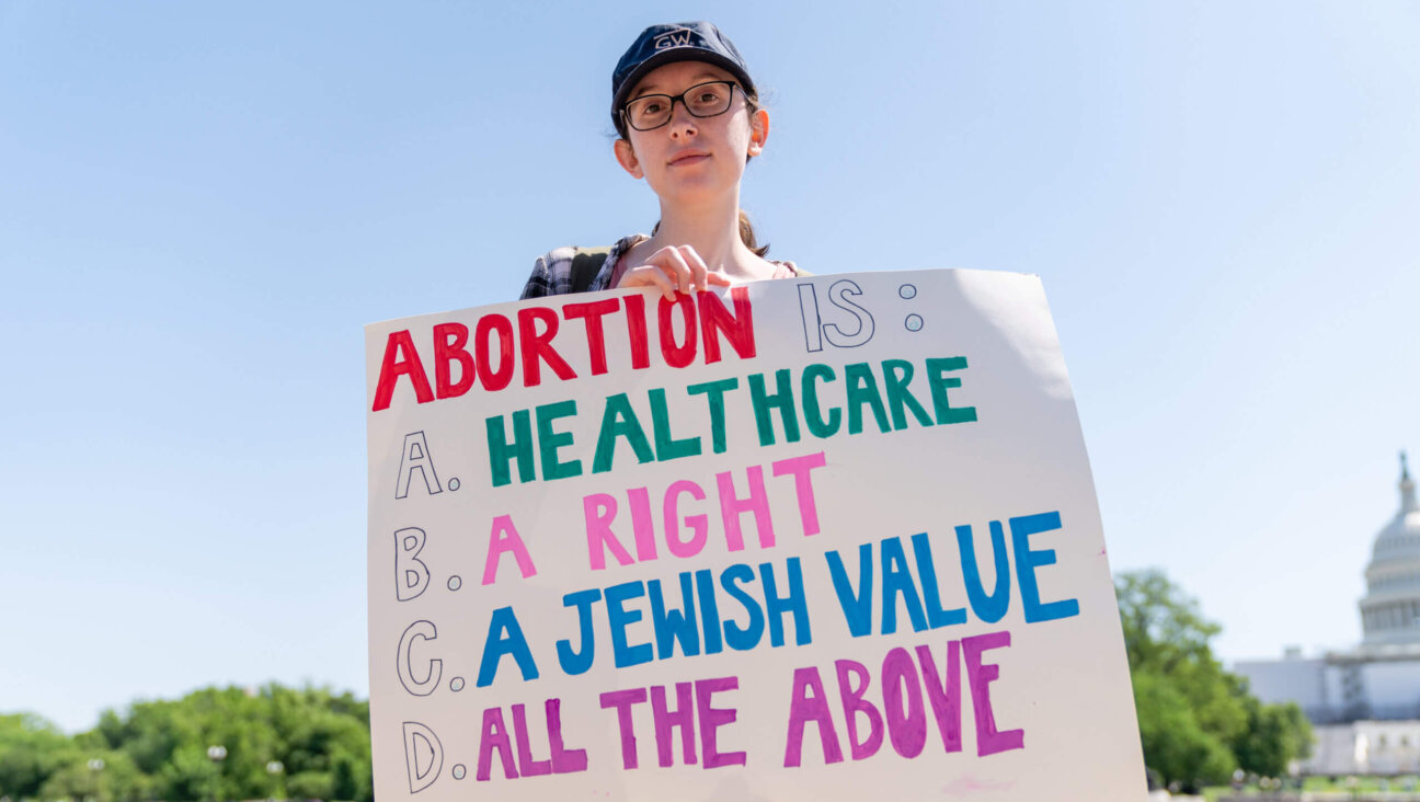 Michelle Rechtman, 21, a student at George Washington University, poses for a portrait during the Jewish Rally for Abortion Justice.