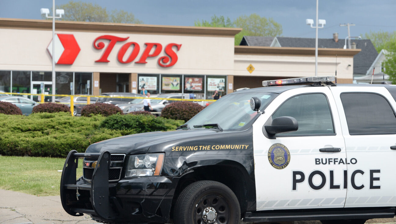 Police on scene at a Tops Friendly Market in Buffalo, New York, after a mass shooting there, May 14, 2022. 