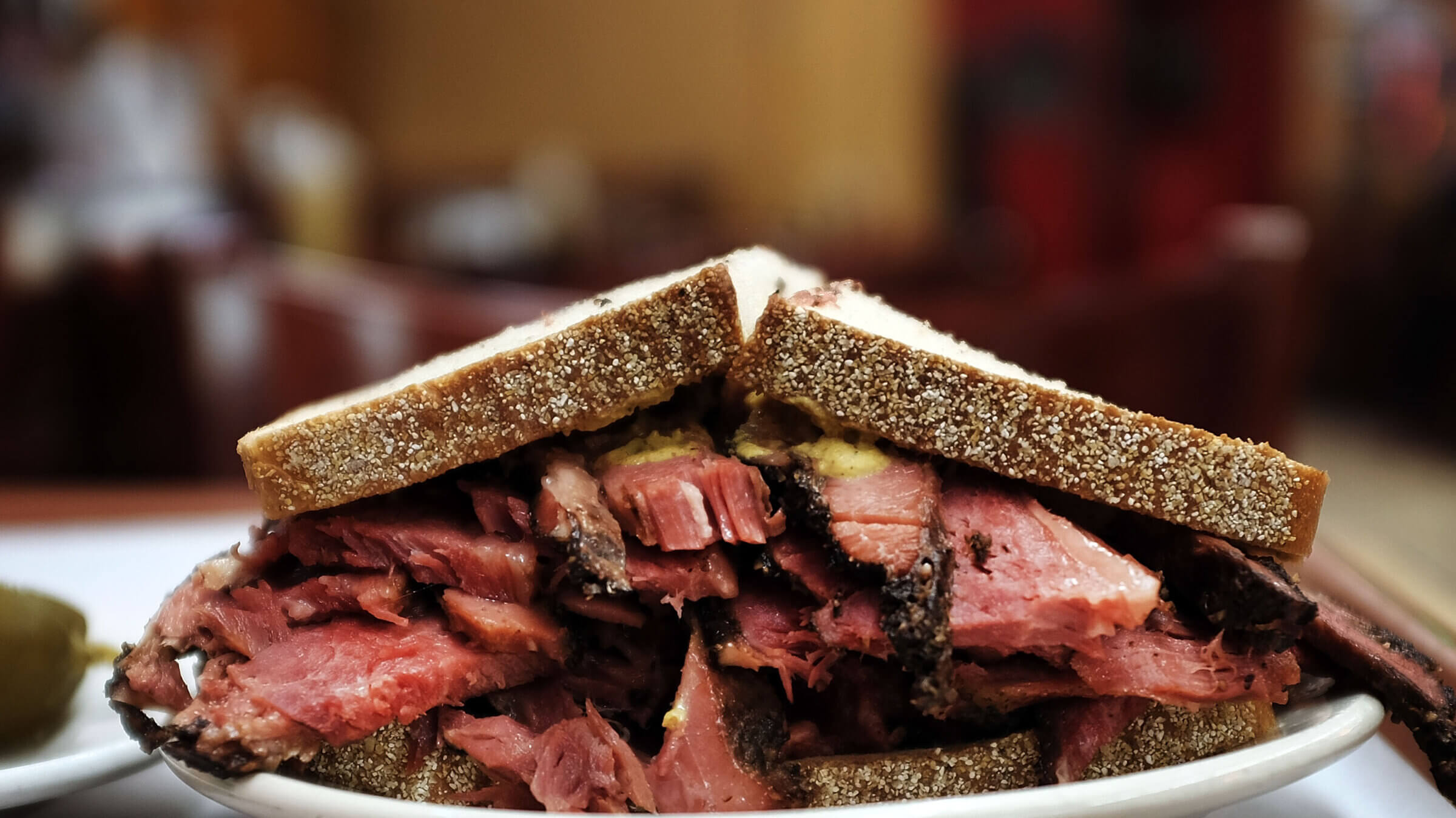 A sign at Katz's claims the deli invented pastrami in 1888.