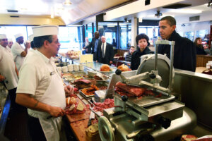 President Barack Obama surveys the pastrami sandwiches and other offerings at Manny's Deli in Chicago in 2008.