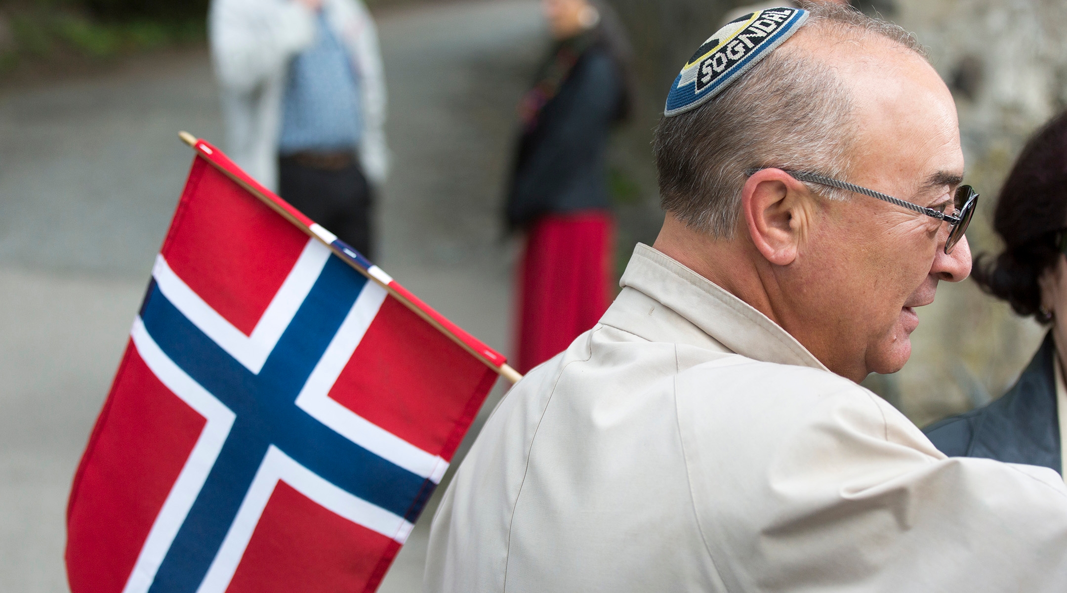 A Jewish man wearing a kippah holds a Norwegian flag on Constitution Day in Oslo. (Fishman/ullstein bild via Getty Images)