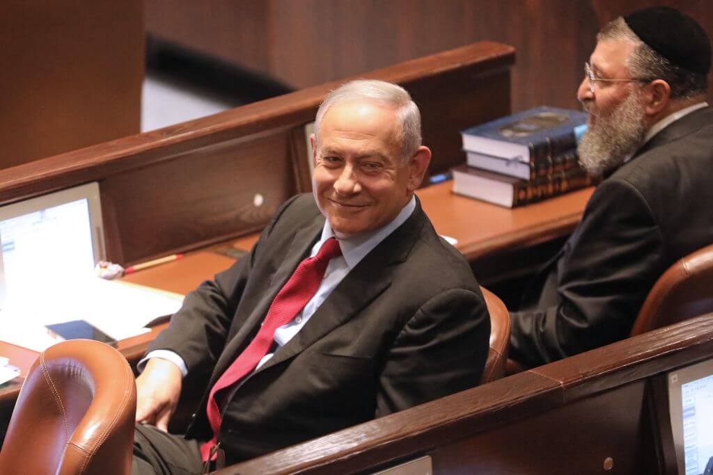 Israeli former premier Benjamin Netanyahu attends a preliminary vote on a bill to dissolve parliament and call an early election, at the Knesset in Jerusalem on June 22, 2022.