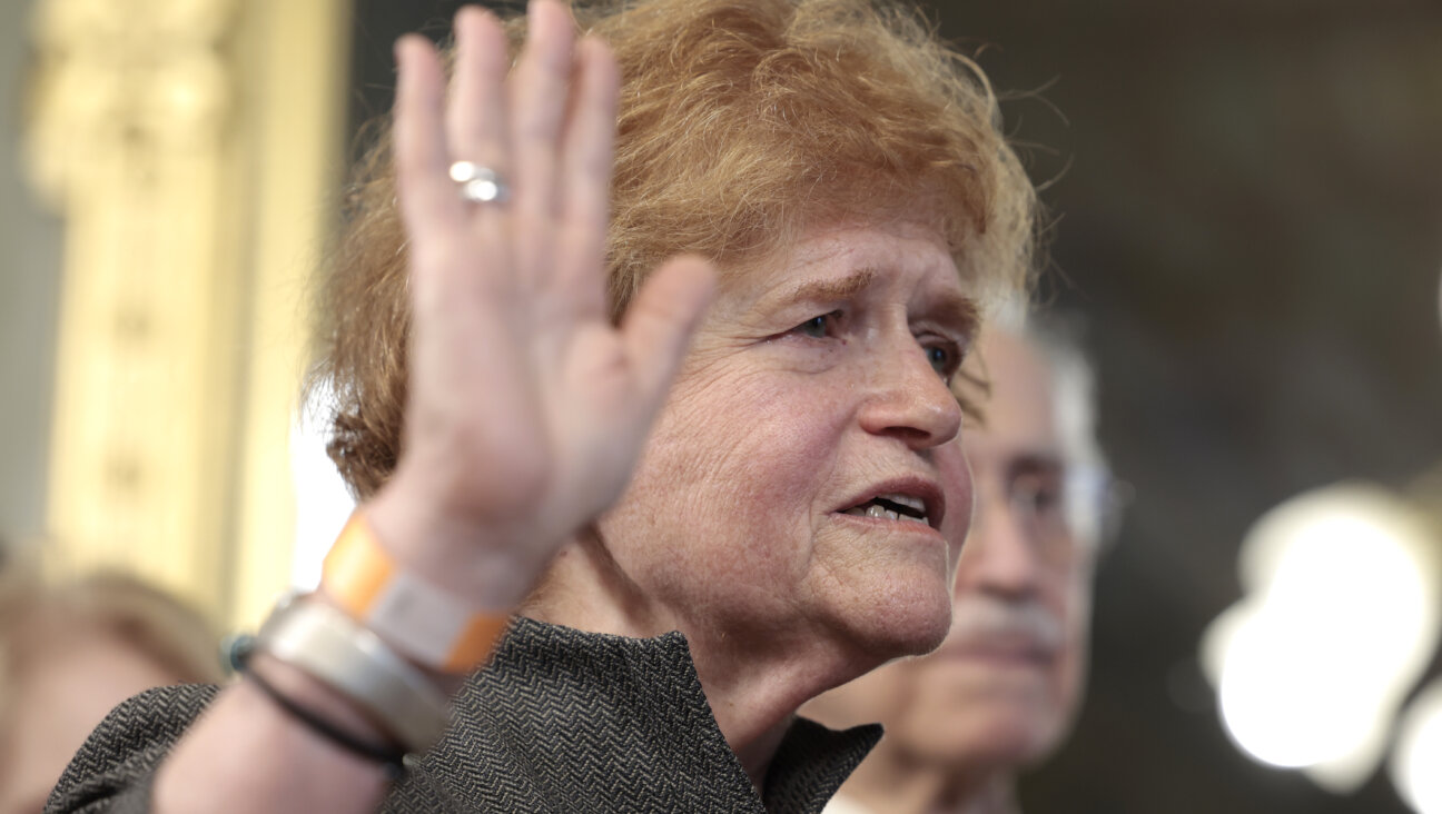 Ambassador Deborah Lipstadt is sworn in by U.S. Vice President Kamala Harris in her ceremonial office of the Eisenhower Executive Office Building on May 24, 2022