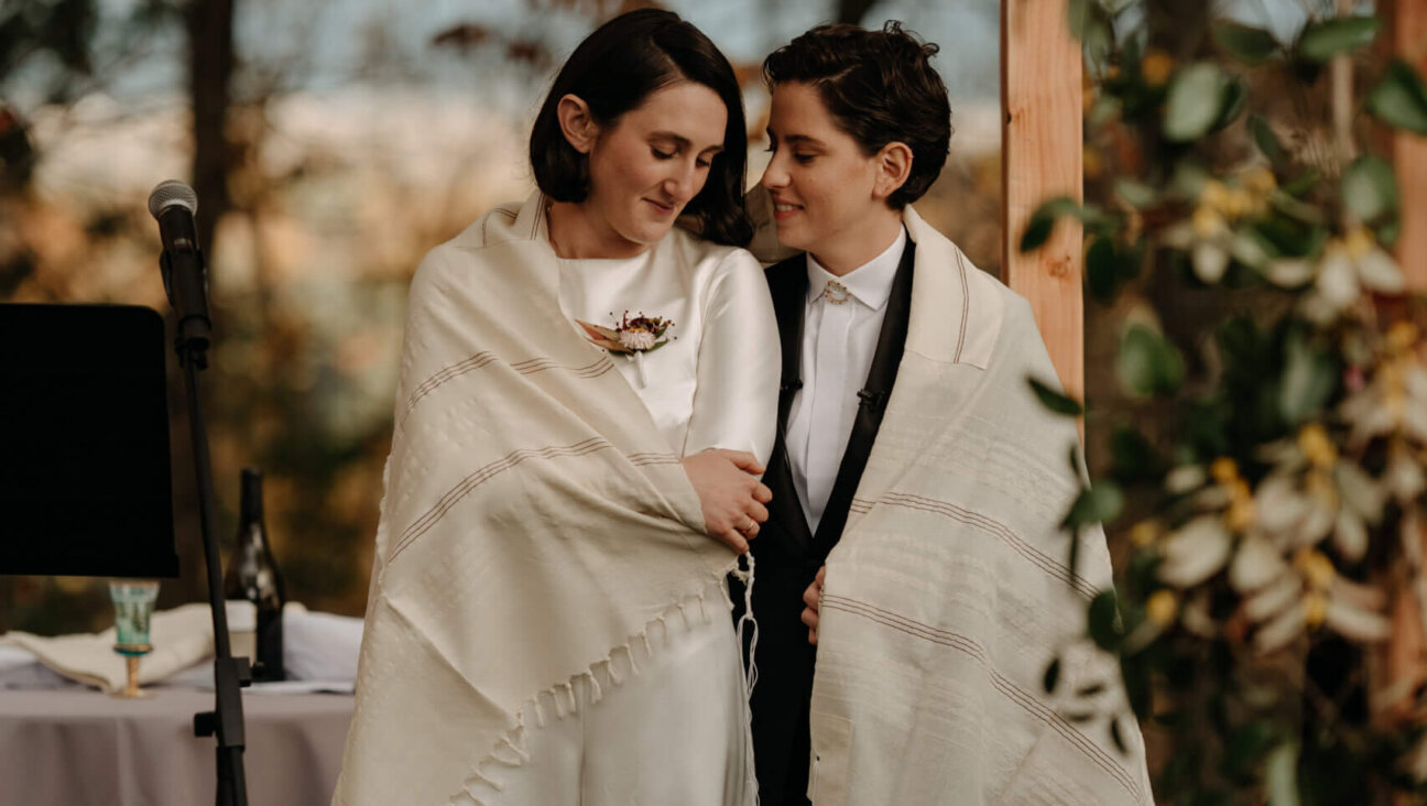 Tamar Lindenbaum, left, and Sabina Tilevitz pose for a wedding photo.