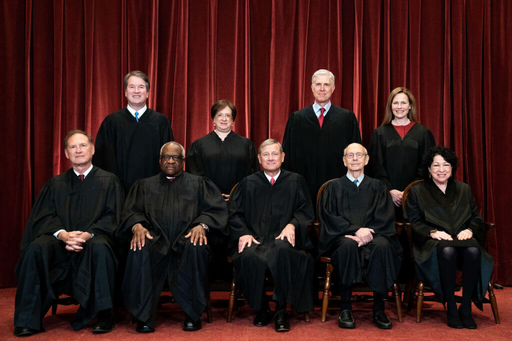 Members of the Supreme Court pose for a group photo at the Supreme Court in Washington, DC on April 23, 2021. Seated from left: Associate Justice Samuel Alito, Associate Justice Clarence Thomas, Chief Justice John Roberts, Associate Justice Stephen Breyer and Associate Justice Sonia Sotomayor. Standing from left: Associate Justice Brett Kavanaugh, Associate Justice Elena Kagan, Associate Justice Neil Gorsuch and Associate Justice Amy Coney Barrett.