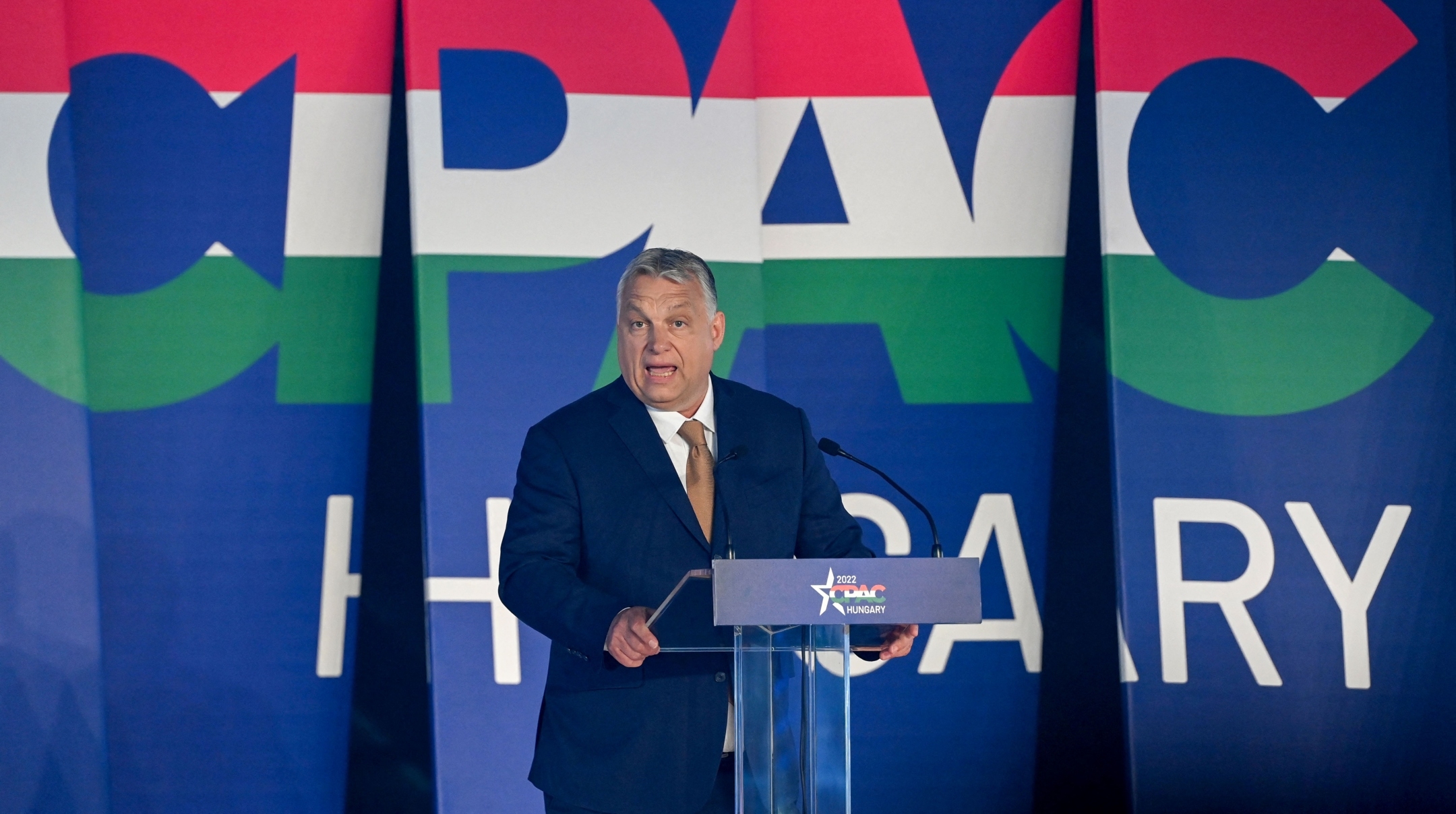 Hungarian Prime Minister Viktor Orban addresses a keynote speech during an extraordinary session of the Conservative Political Action Conference (CPAC) at the Balna cultural center of Budapest, May 19, 2022. (Attila Kisbenedek/AFP via Getty Images)