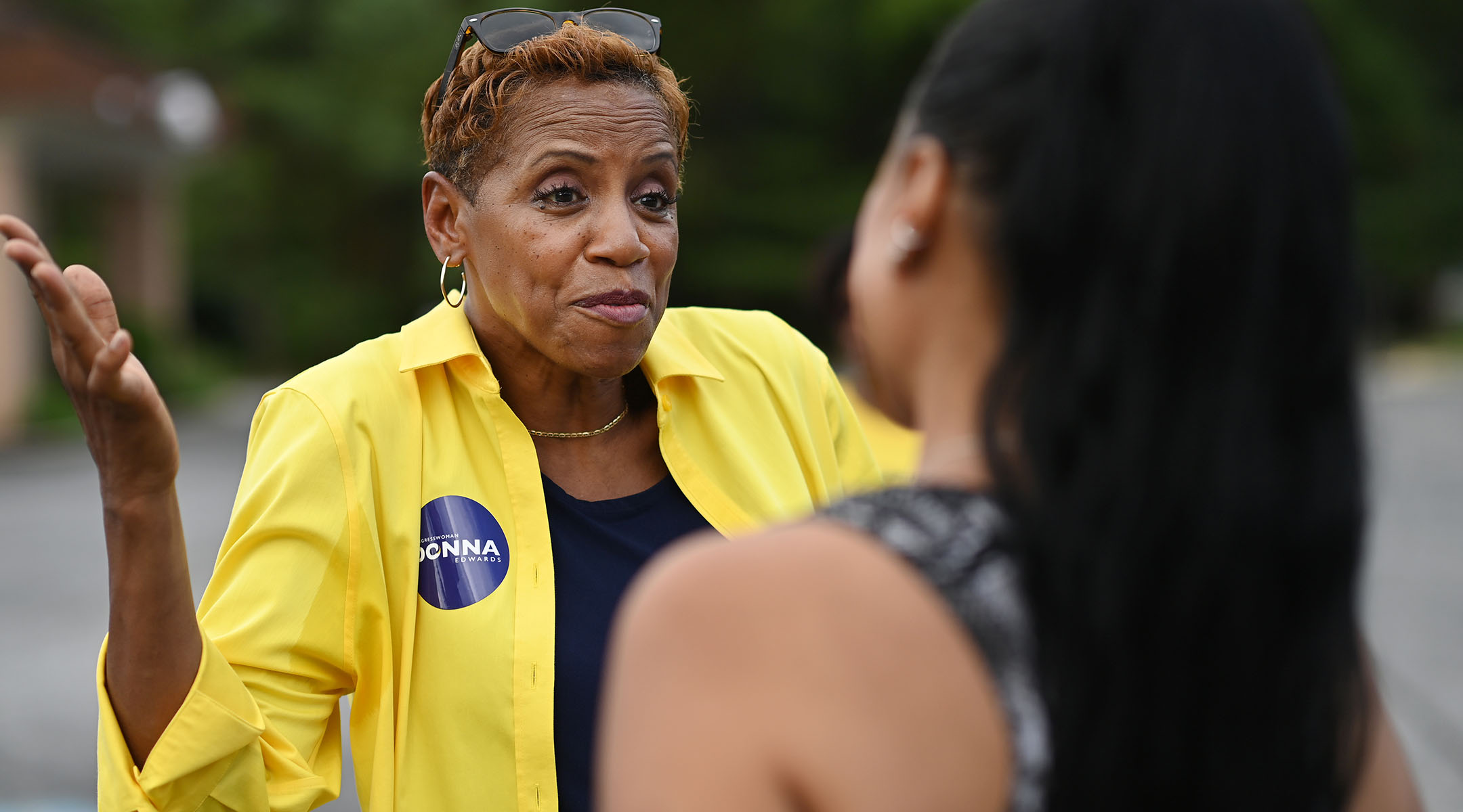 Donna Edwards greets a voter at Breath of Life Seventh-day Adventist Church in Fort Washington, Md., July 19, 2022. (Matt McClain/The Washington Post via Getty Images)