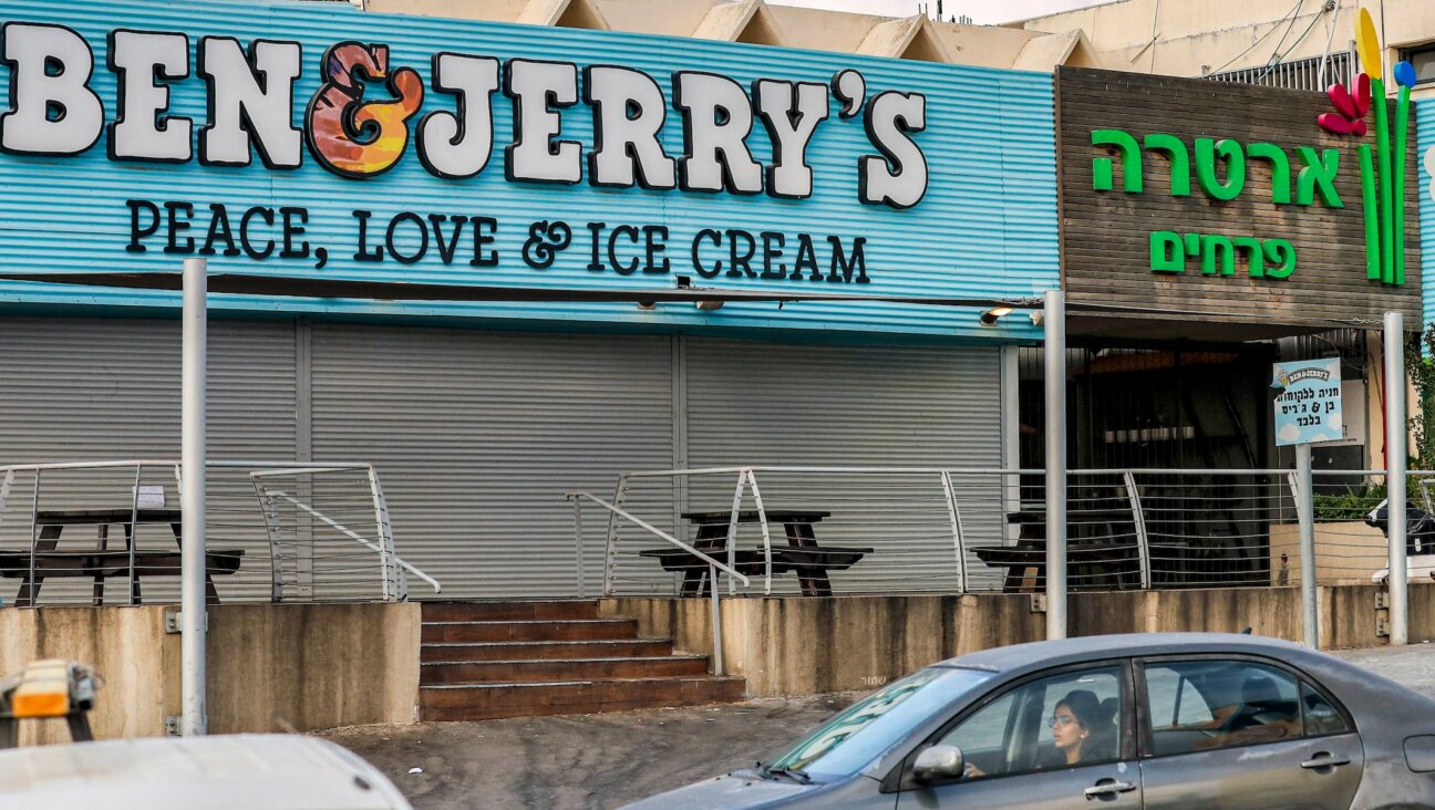 Motorists drive past a closed Ben & Jerry’s ice-cream shop in the Israeli city of Yavne, south of Tel Aviv, July 23, 2021. (Ahmad Gharabli/AFP via Getty Images)