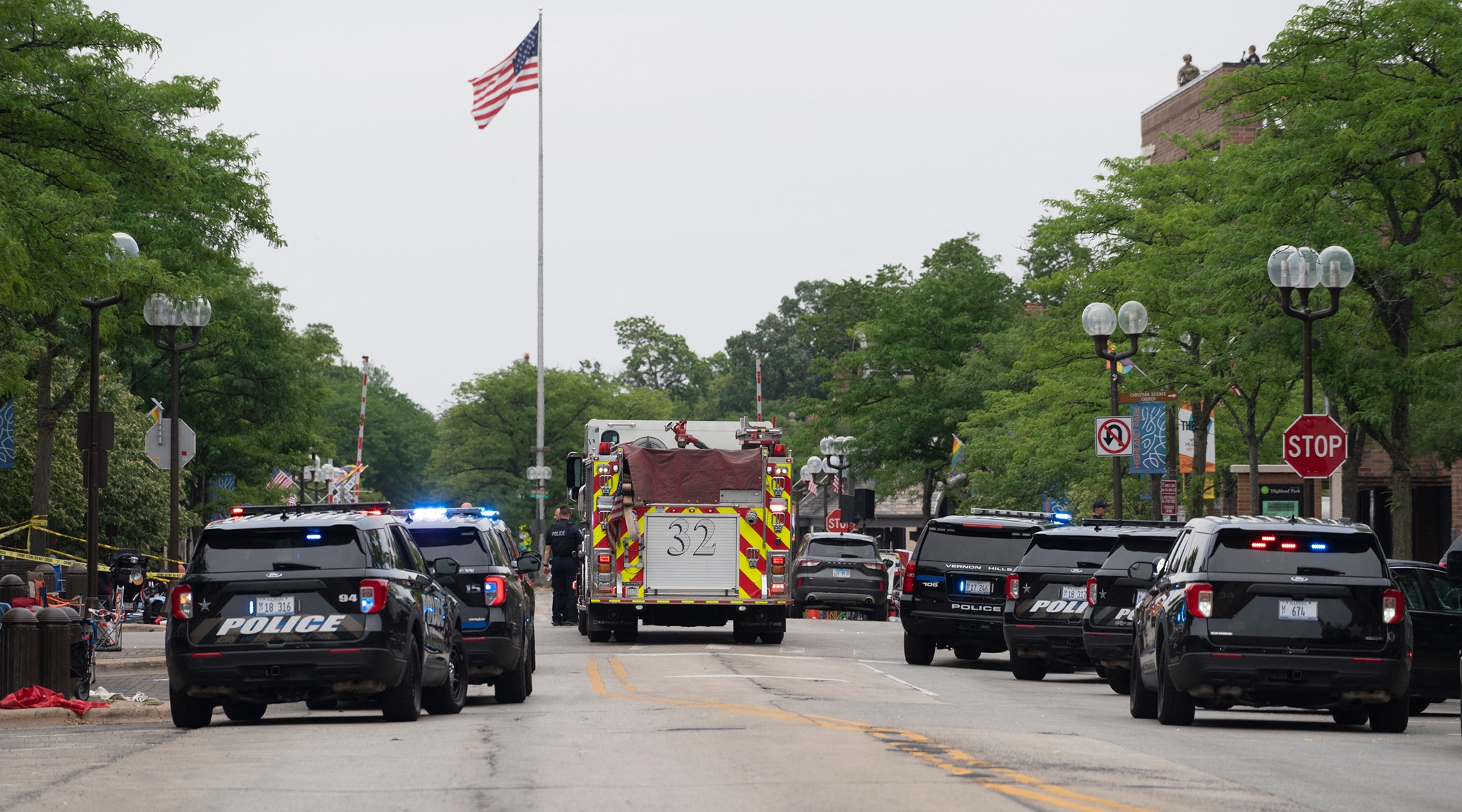 First responders and police force are seen at the scene of the shooting at a July 4 parade in Highland Park, Ill., July 4, 2022. (Youngrae Kim/AFP via Getty Images)