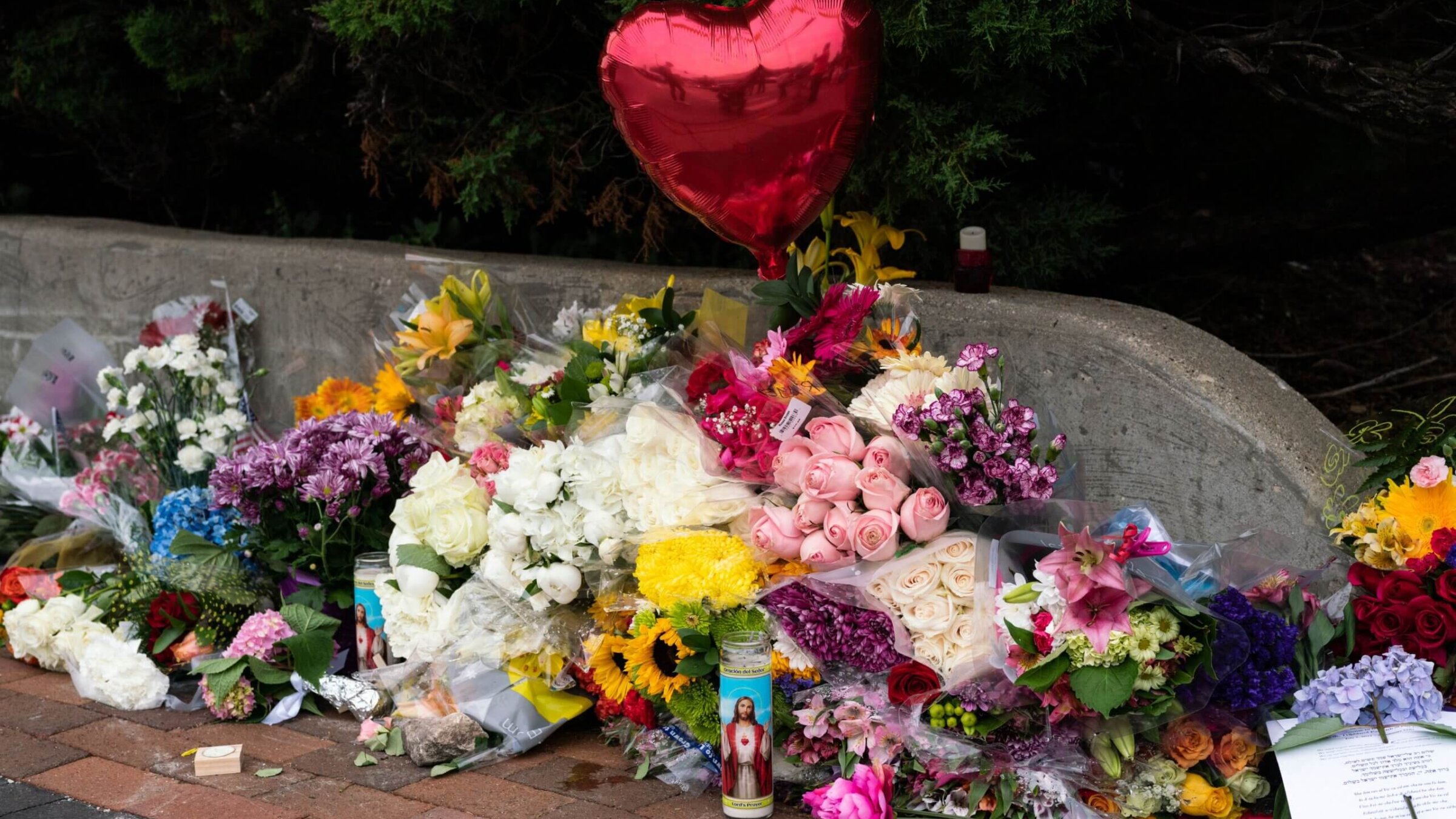 A makeshift memorial for victims of the 4th of July mass shooting in Highland Park, Illinois.