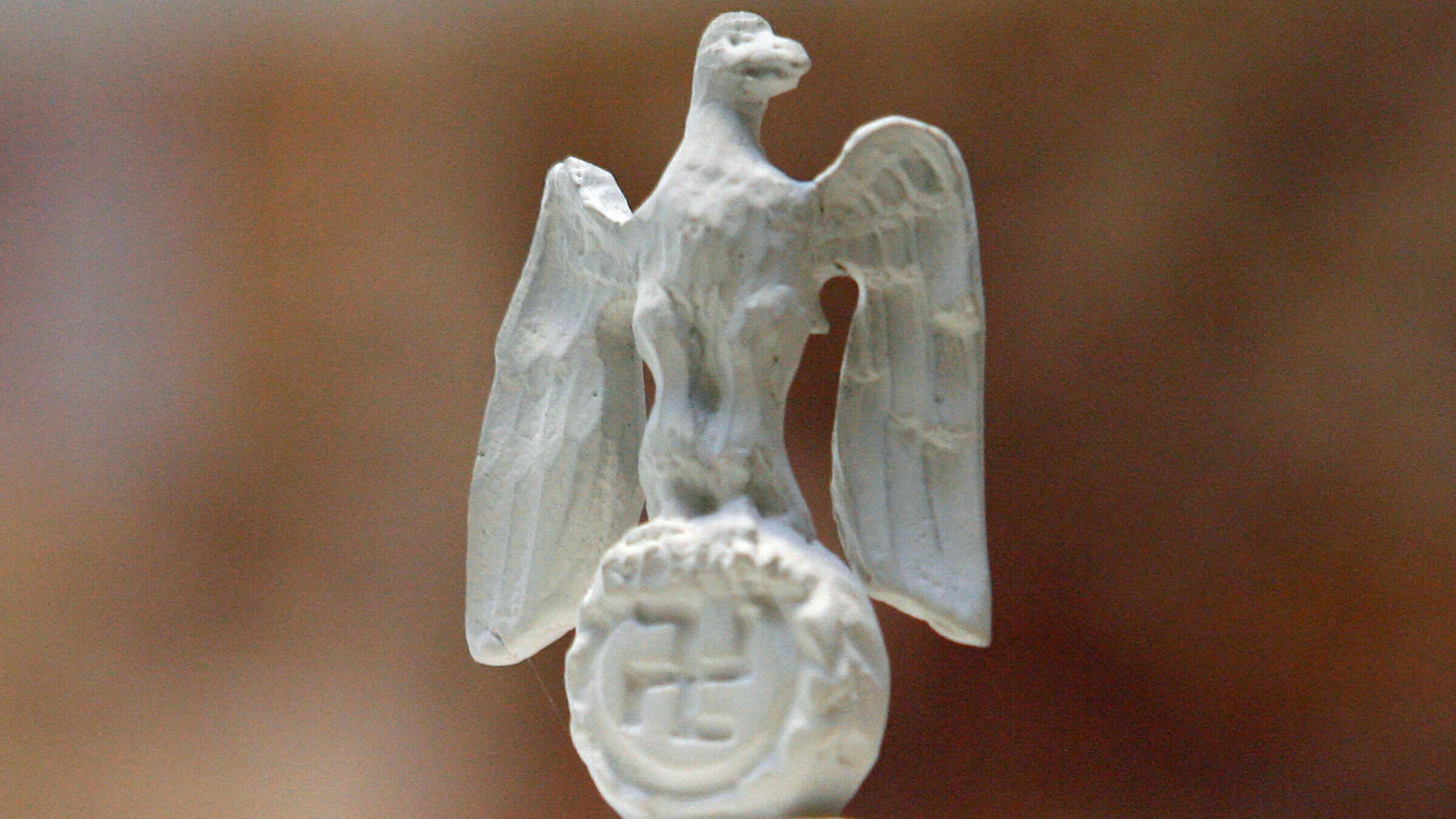 A Nazi eagle atop a model of the so-called “Great Hall,” intended to be the centerpiece of the German capital had the Nazis won World War II.