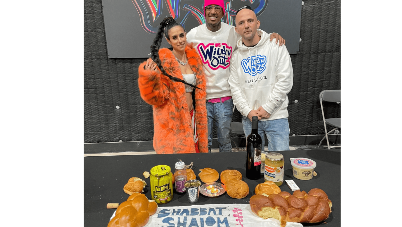 Israeli comedian Or Mash, left, stands with Nick Cannon, center, and rapper Kosha Dillz, right. Mash and Dillz were chosen to appear on Cannon’s “Wild ’N Out” show. 