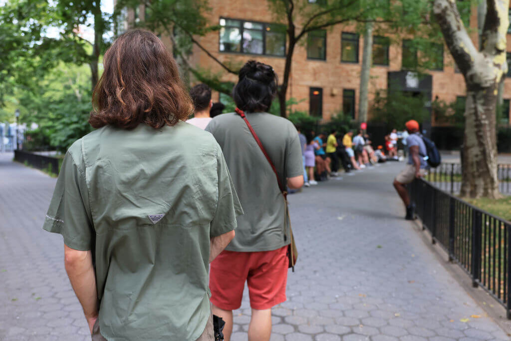 People wait in line to enter the Chelsea Sexual Health Clinic for a monkeypox vaccine on July 8, 2022 in New York City. 
