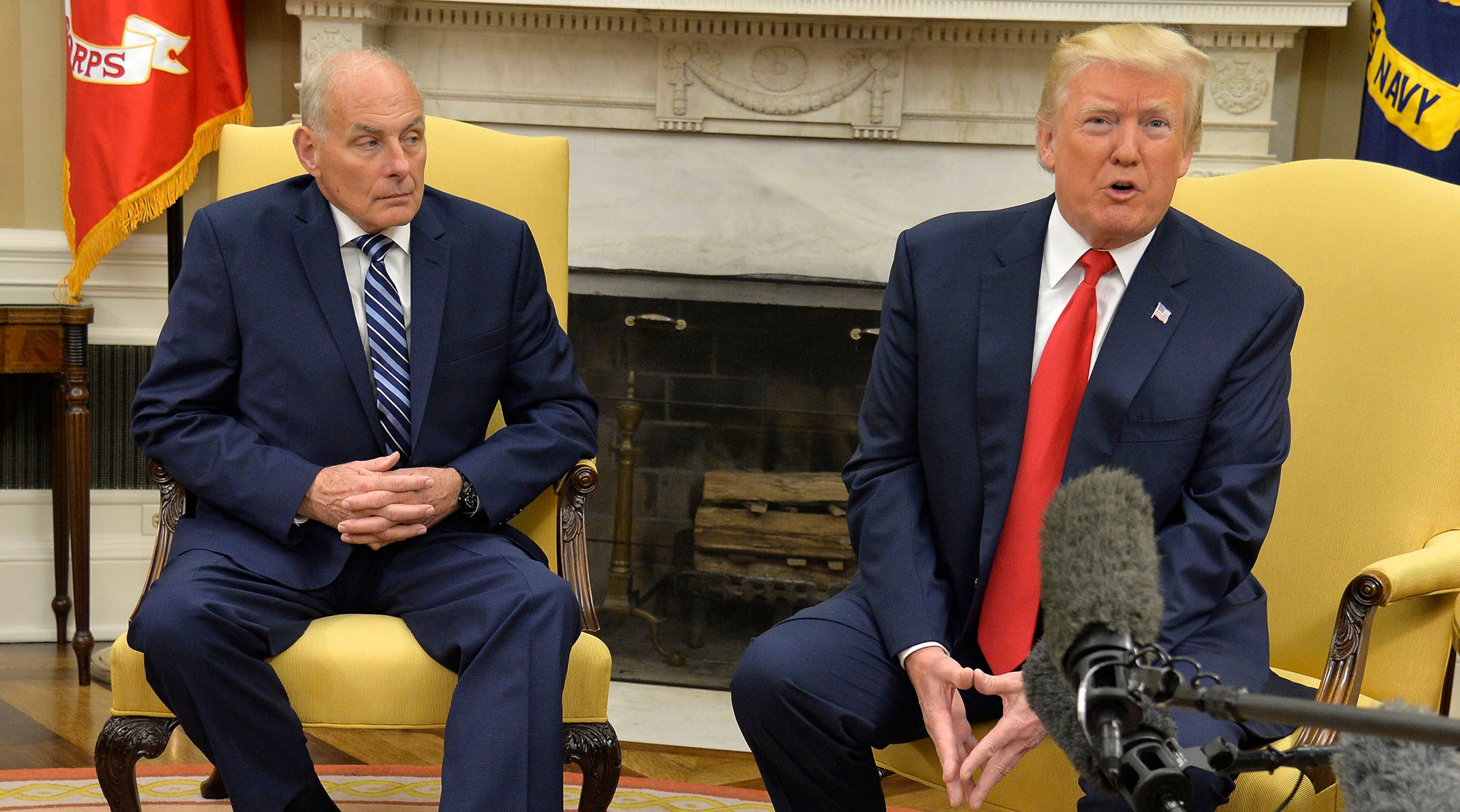 Donald Trump, right, speaks to the press after then White House Chief of Staff John Kelly, left, was sworn in, in Washington D.C., July 31, 2017. (Mike Theiler-Pool/Getty Images)