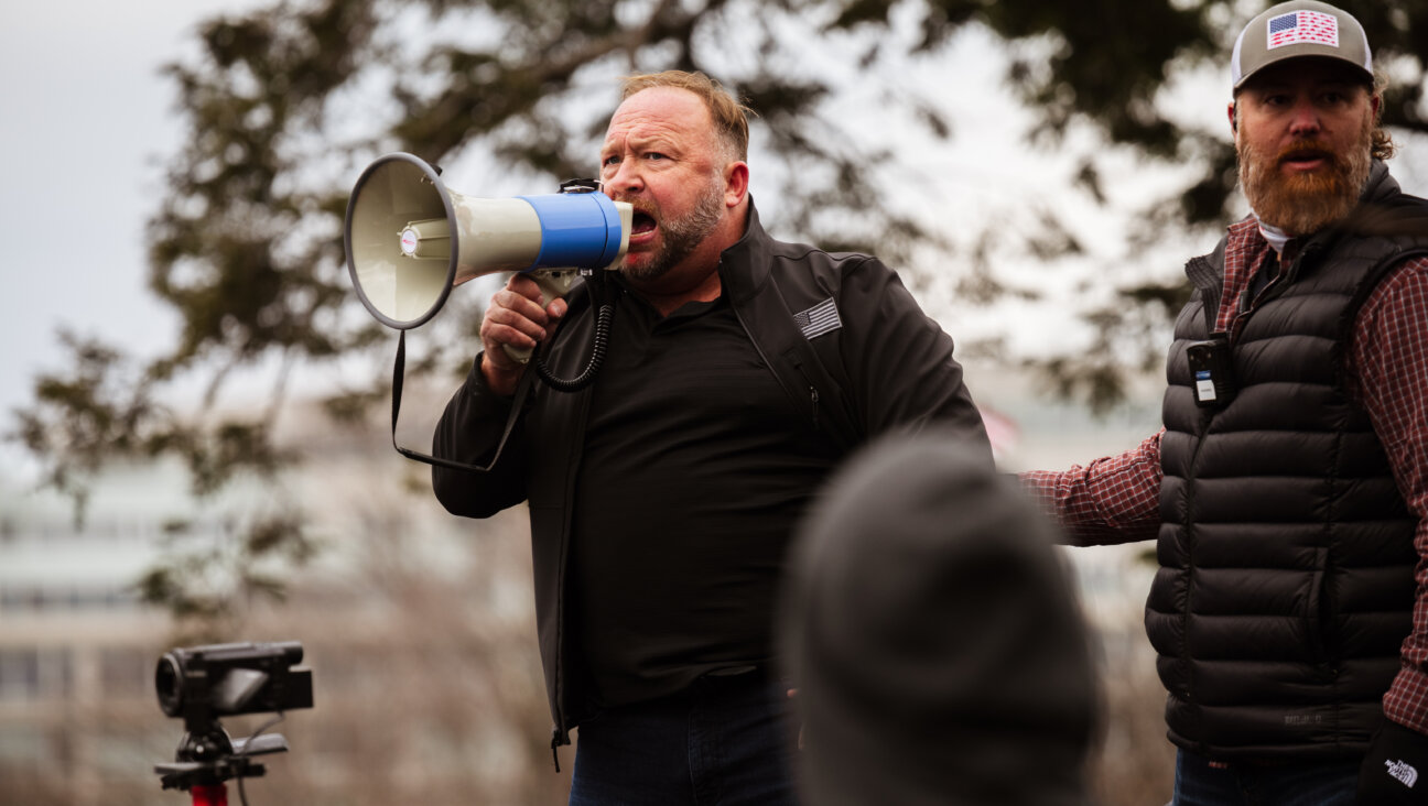 Alex Jones with a megaphone 