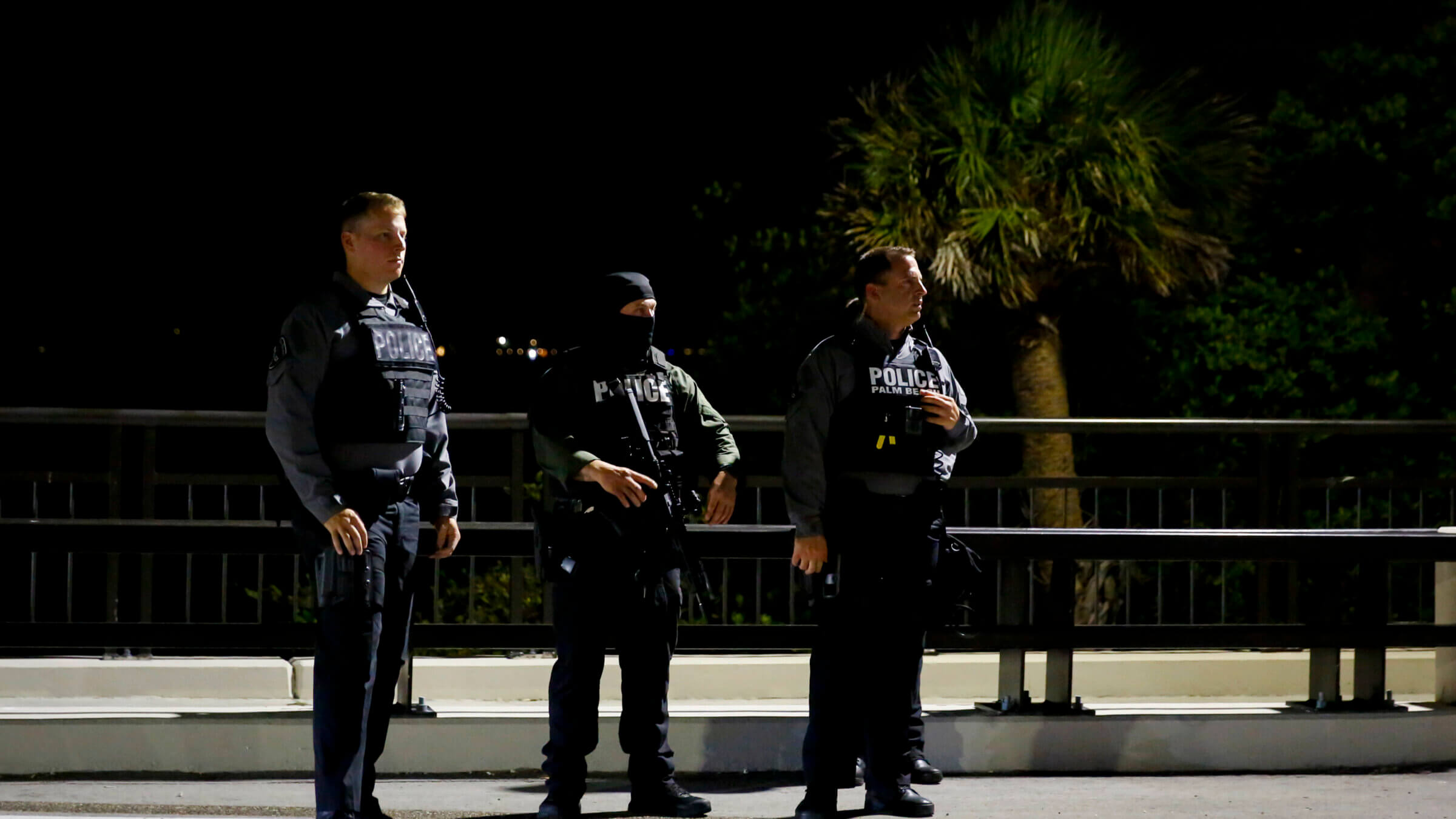 Palm Beach police officers keep watch near the home of former President Donald Trump at Mar-A-Lago on Aug. 8, 2022 ,in Palm Beach, Florida. The FBI raided the home to retrieve classified White House documents.