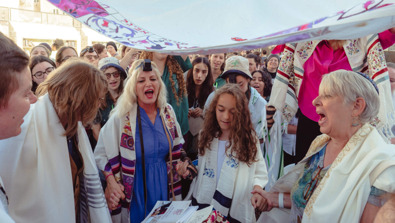 Lucia da Silva, center, prays with Women of the Wall during her bat mitzvah ceremony.