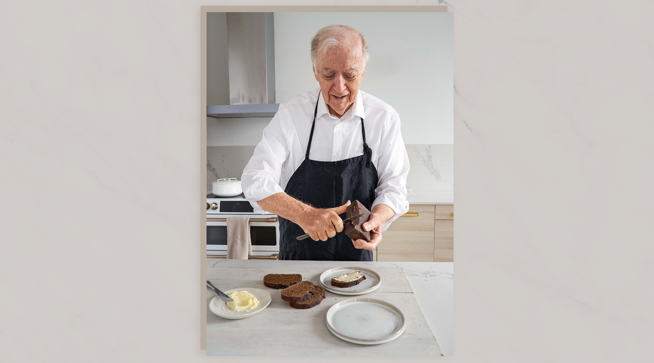 Eugene Ginter makes the chocolate sandwich that his mother made for him after he was liberated from Auschwitz. (Ellen Silverman)