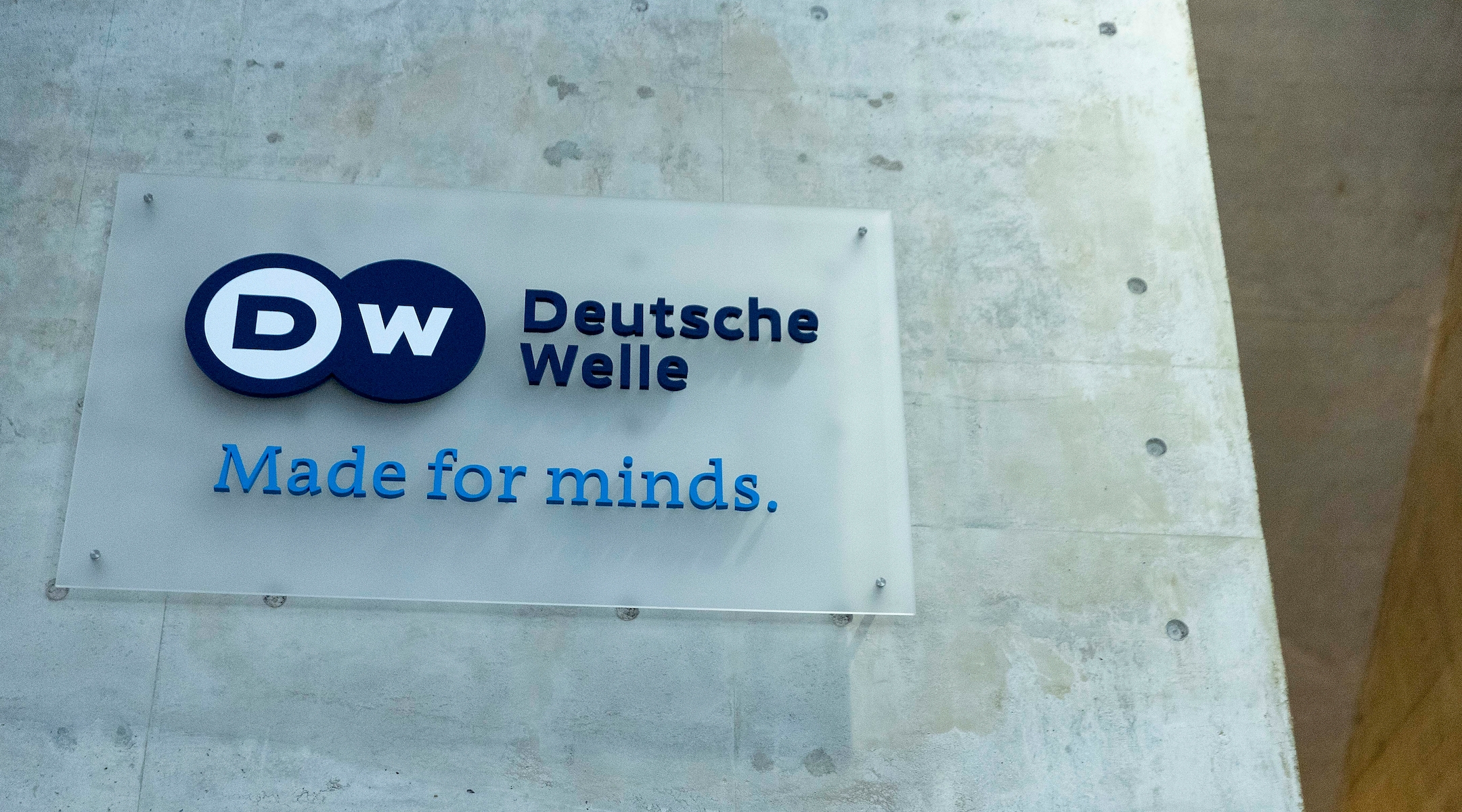 The Deutsche Welle logo is seen on the foyer of the German broadcaster’s Berlin location, March 2, 2022. (Carsten Koall/picture alliance via Getty Images)