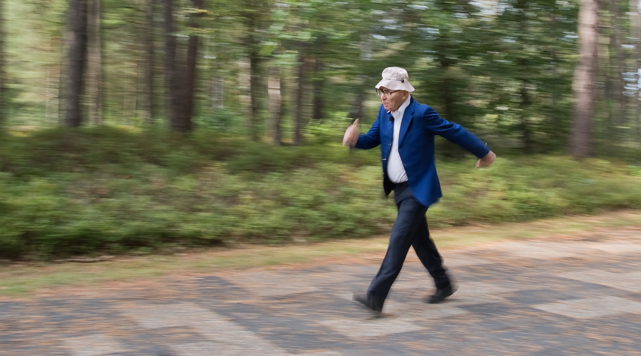 Shaul Ladany walking at the Bergen-Belsen concentration camp memorial in 2019. (Julian Stratenschulte/picture alliance via Getty Images)