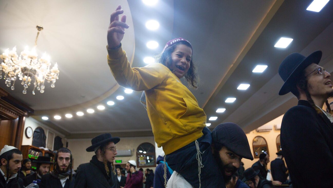 The joyous gatherings of Hasidic pilgrims have gone on as planned in Uman, Ukraine, for those who made the trip into the war-torn country. (David Saveliev)