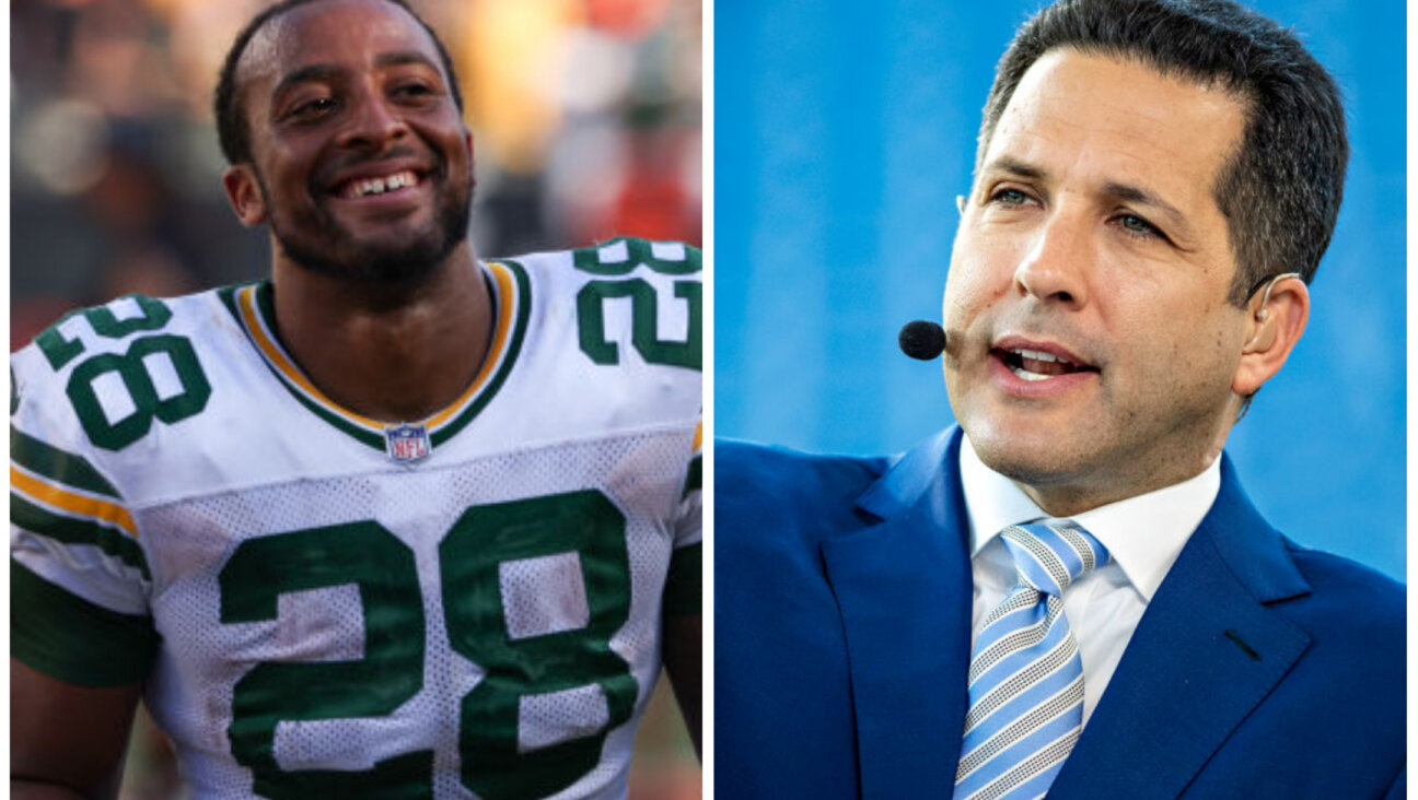 Packers running back AJ Dillon, left; Adam Schefter, right.