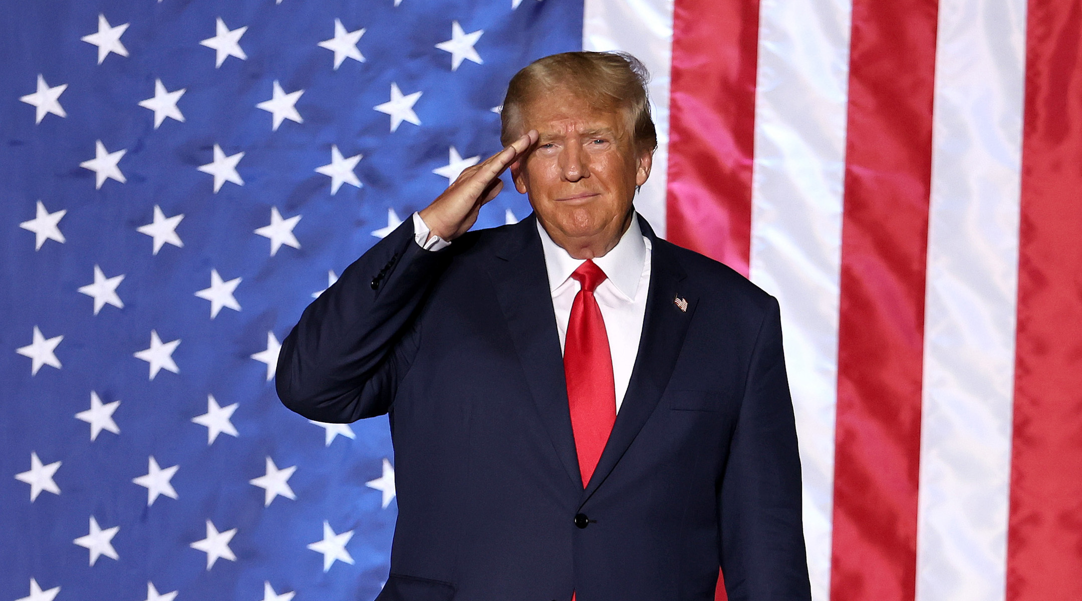 Donald Trump salutes supporters during a rally at Minden-Tahoe Airport in Minden, Nev., Oct. 8, 2022. (Justin Sullivan/Getty Images)