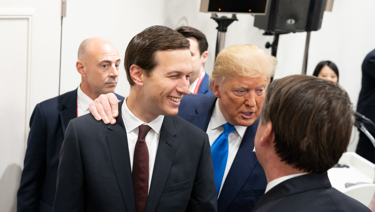 President Donald Trump speaks with Senior Advisor Jared Kushner on June 28, 2019. 