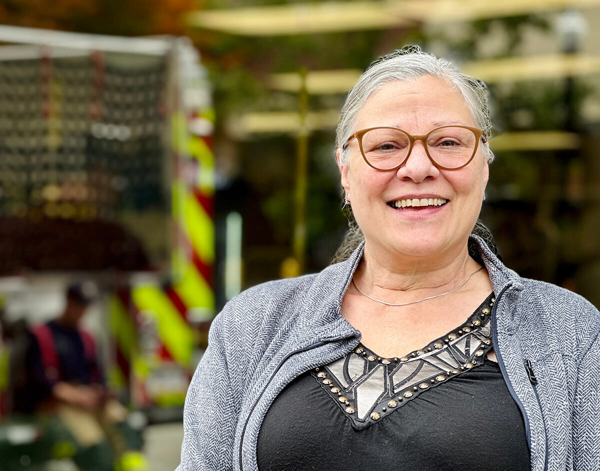 Dea Fern, who has lived in Pittsburgh for decades, in front of Murray Avenue Kosher.