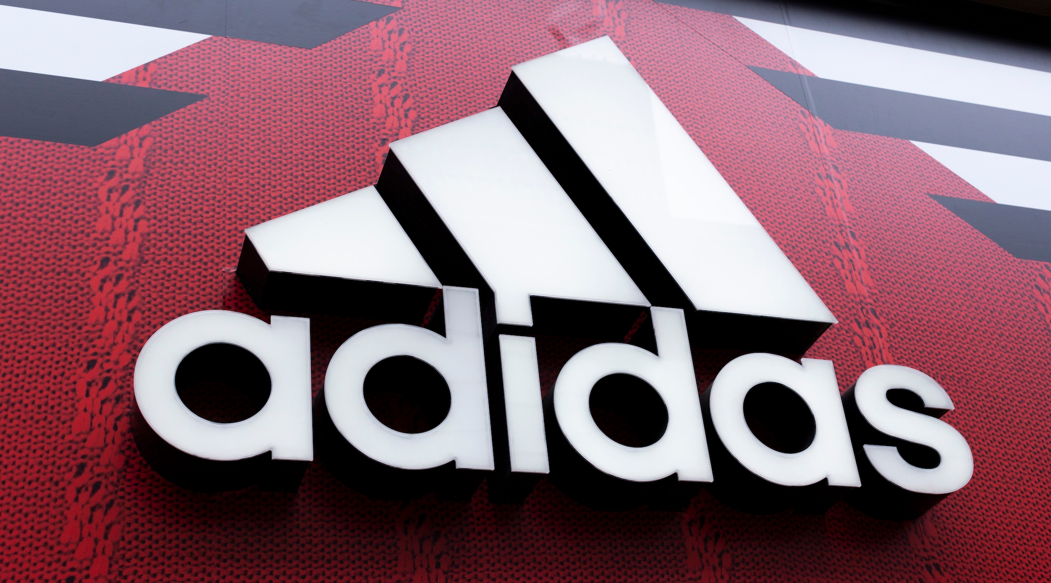 The Adidas logo is pictured on a building in Manchester, England, July 14, 2022. (Daniel Harvey Gonzalez/In Pictures via Getty Images)