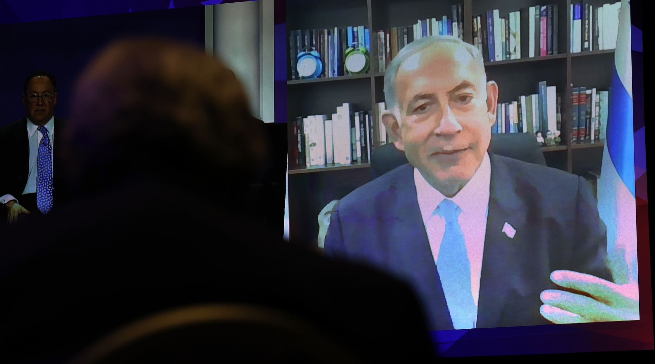 Former Israeli Prime Minister Benjamin Netanyahu speaks via video link to guests attending the Republican Jewish Coalition annual leadership meeting in Las Vegas, Nov. 19, 2022. (Scott Olson/Getty Images)