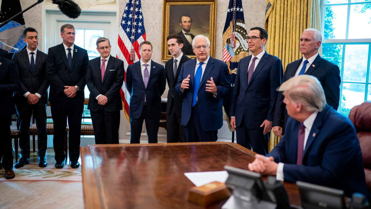 President Donald J. Trump listens to U.S. Ambassador to Israel David M. Friedman in the Oval Office on Sept. 11, 2020. 