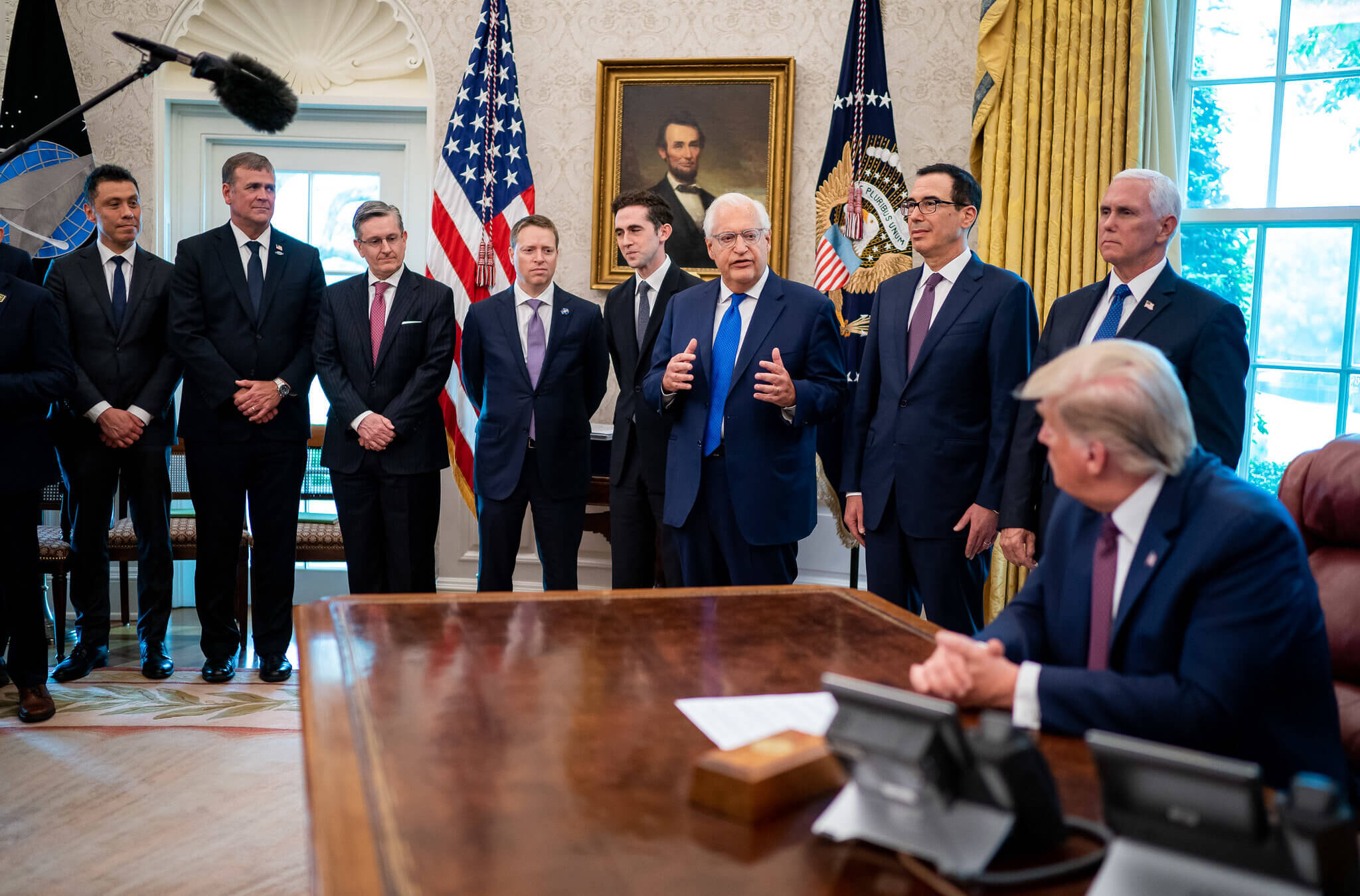 President Donald J. Trump listens to U.S. Ambassador to Israel David M. Friedman in the Oval Office on Sept. 11, 2020. 