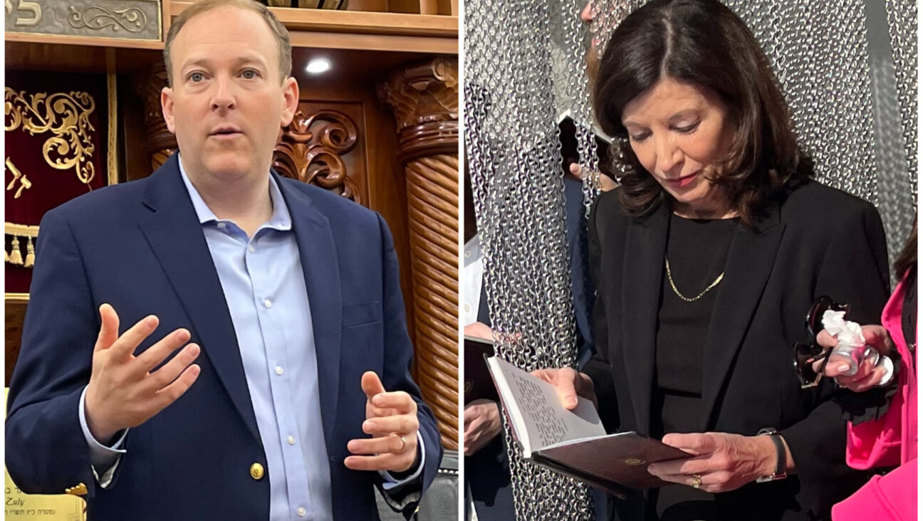 From left, Rep. Lee Zeldin addresses Orthodox congregants; his Democratic opponent in the New York governor's race, incumbent Gov. Kathy Hochul, prays at the gravesite of the Lubavitcher rebbe.