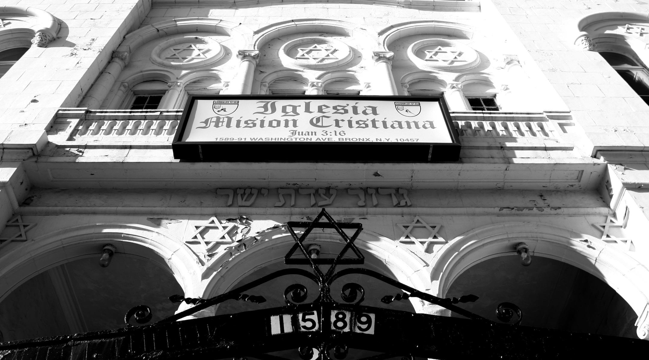 The former synagague Beth Hamedrash Hagadol on E. 172nd St. in the Bronx is now a church. This photo is part of the exhibit “Remnants of the Jewish Bronx” from Julian Voloj, which is on view in the Henry S. Miller Judaica Research room at Fordham University. (Julian Voloj)