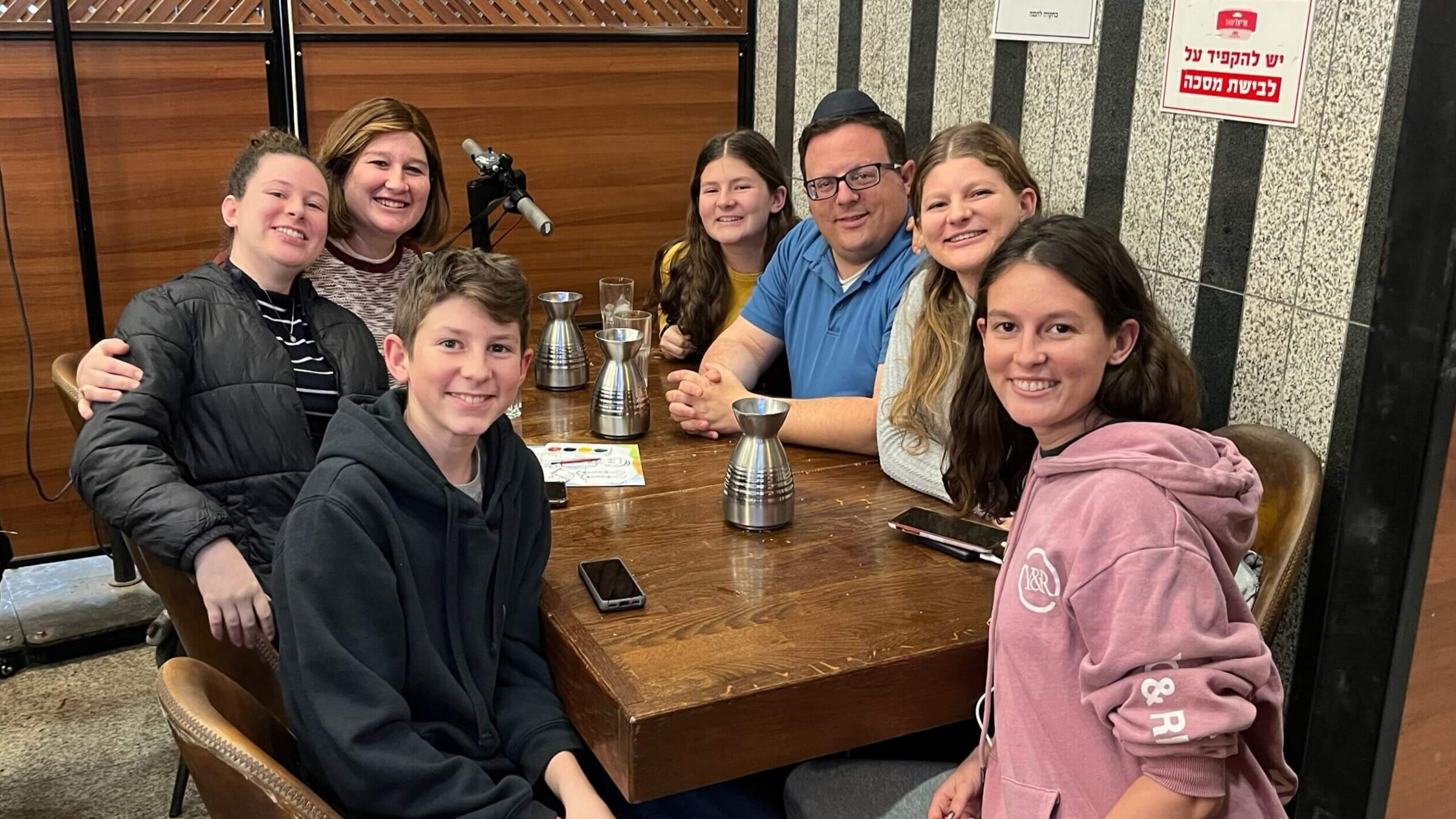 The author with his family, including his daughter Naomi (second from left) who survived the Nov. 23 bombing in Jerusalem. 