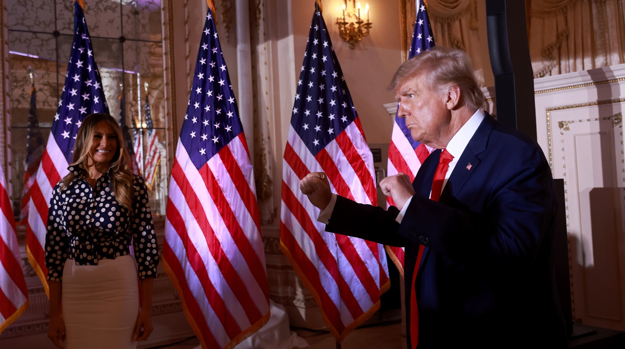 Former U.S. President Donald Trump and former first lady Melania Trump prepare to leave an event at his Mar-a-Lago home in Palm Beach, Fla., Nov. 15, 2022. (Joe Raedle/Getty Images)