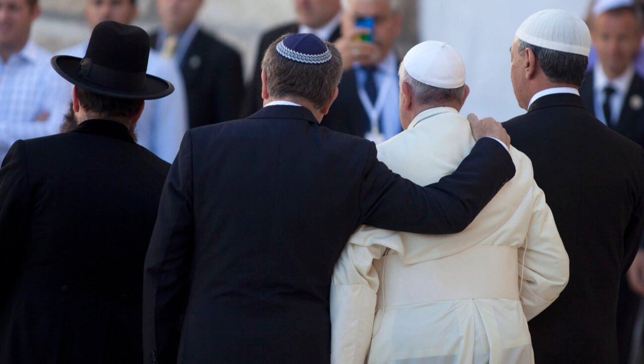 Pope Francis and Rabbi Abraham Skorka leave the Western Wall compound, after the pope prayed at the Wall in Jerusalem, Israel, May 26, 2014. 