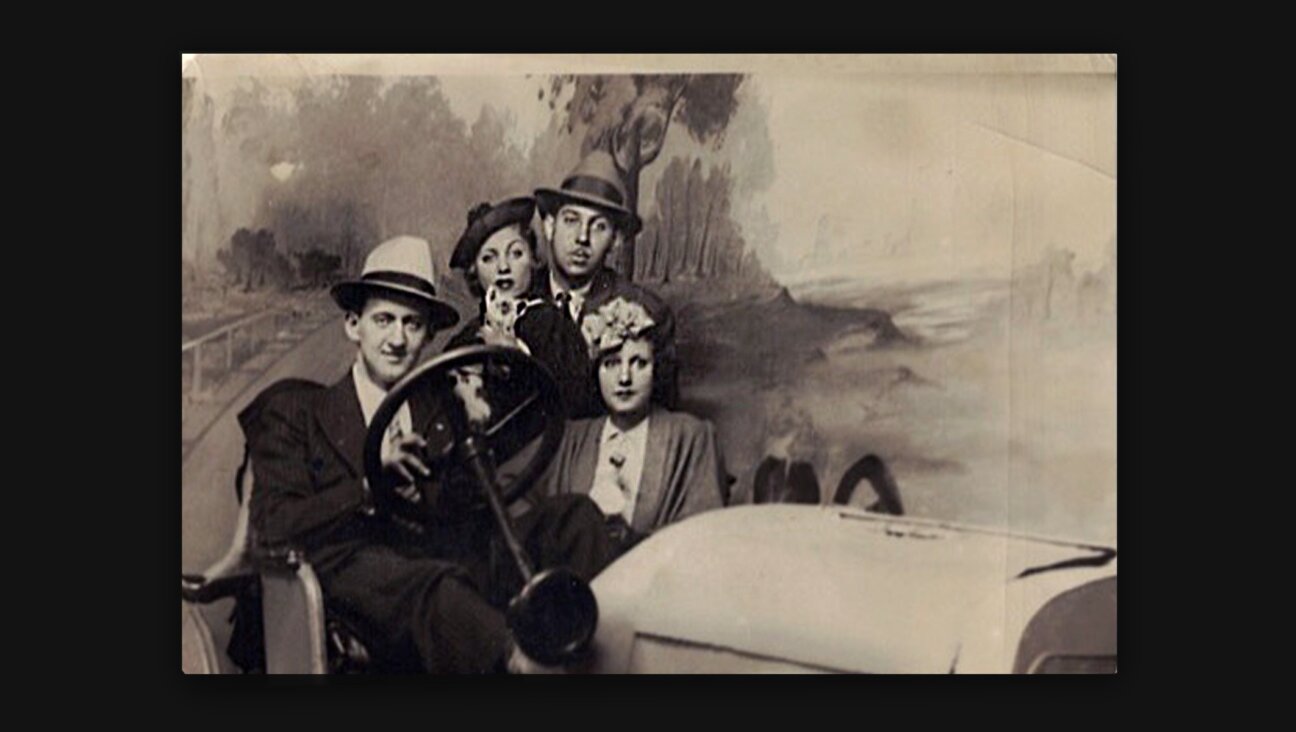 Author Alan Geik’s parents, Lou and Reba Geik, foreground, pose for a photo at a penny arcade with the mobster Benny Kassop and his mistress Sylvia Lorber, perhaps in the 1940s. (Courtesy Alan Geik)