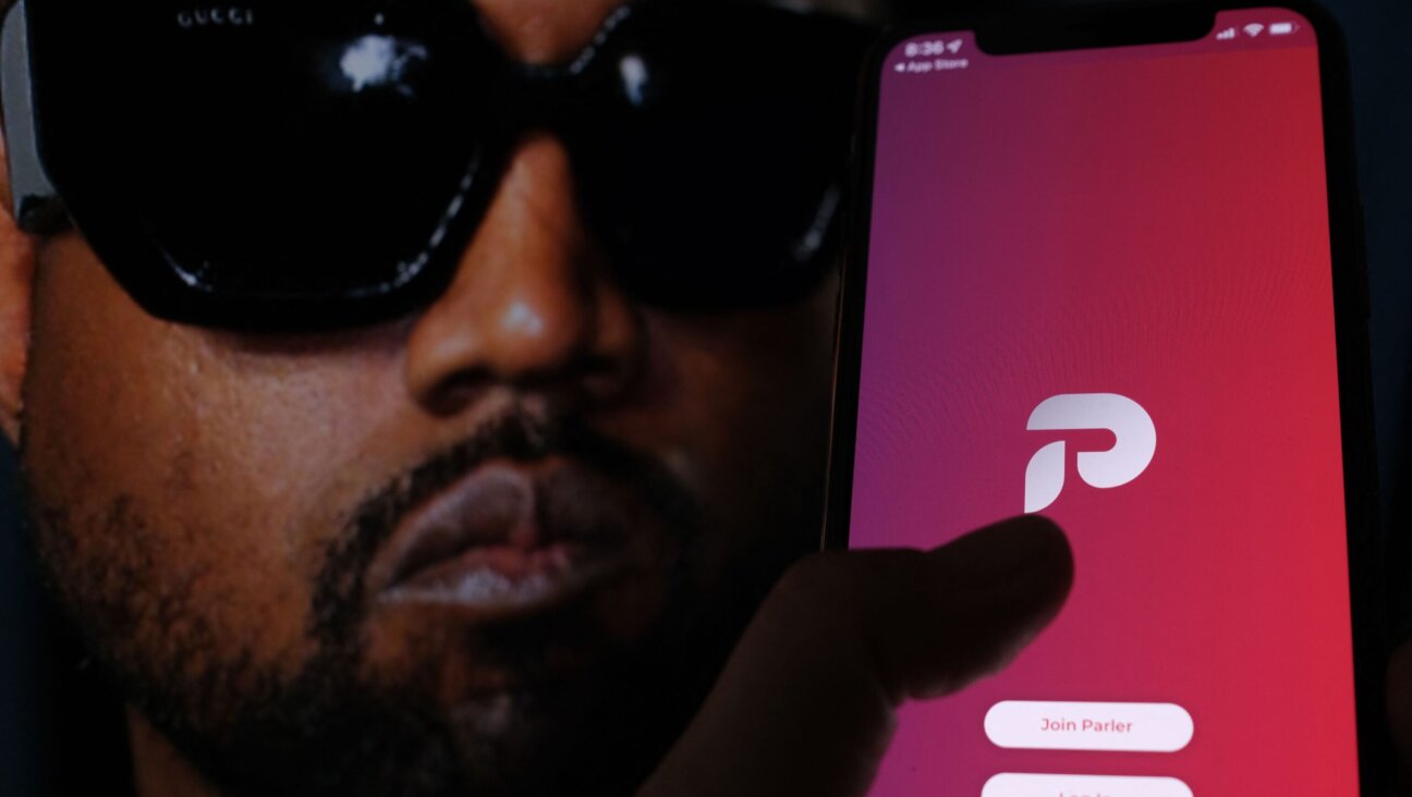 A deal announced in October for Ye to acquire Parler is dead and Ye has been booted from Twitter for a second time after sharing a picture of a swastika. (Chris Delmas/AFP via Getty Images)