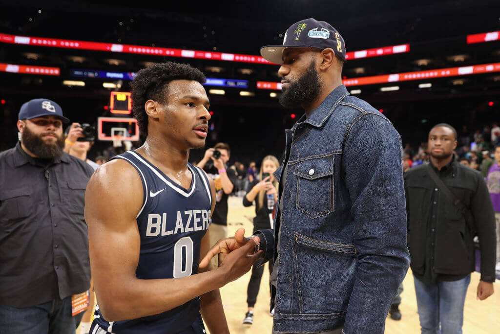 Sierra Canyon's Bronny James is greeted by his father, LeBron James, after a win earlier this month. Sierra Canyon will face Valley Torah tonight.